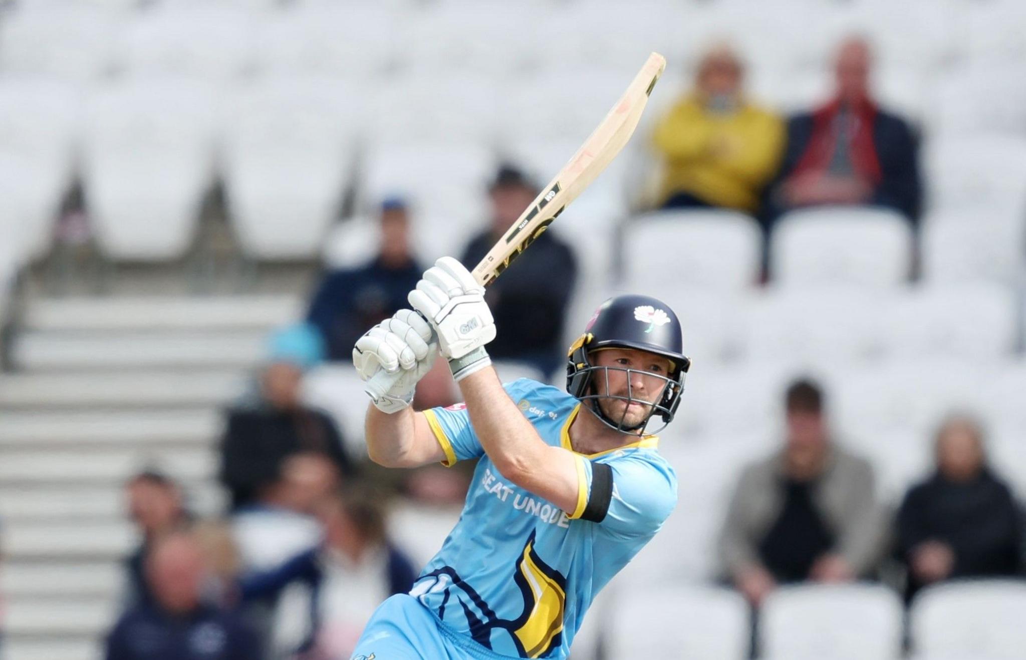 Yorkshire's Adam Lyth raises his bat