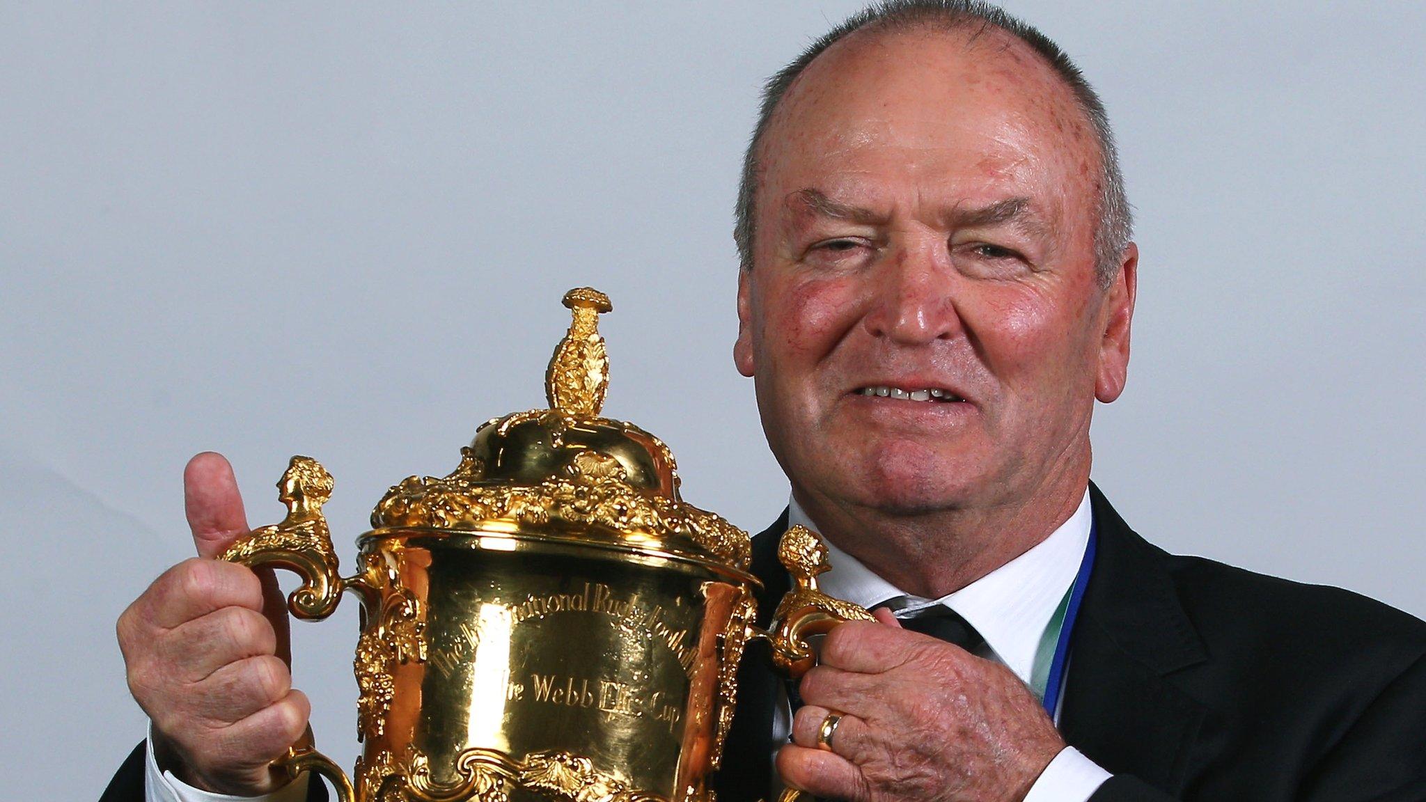 Graham Henry poses with the Rugby World Cup after New Zealand's victory over France in 2011