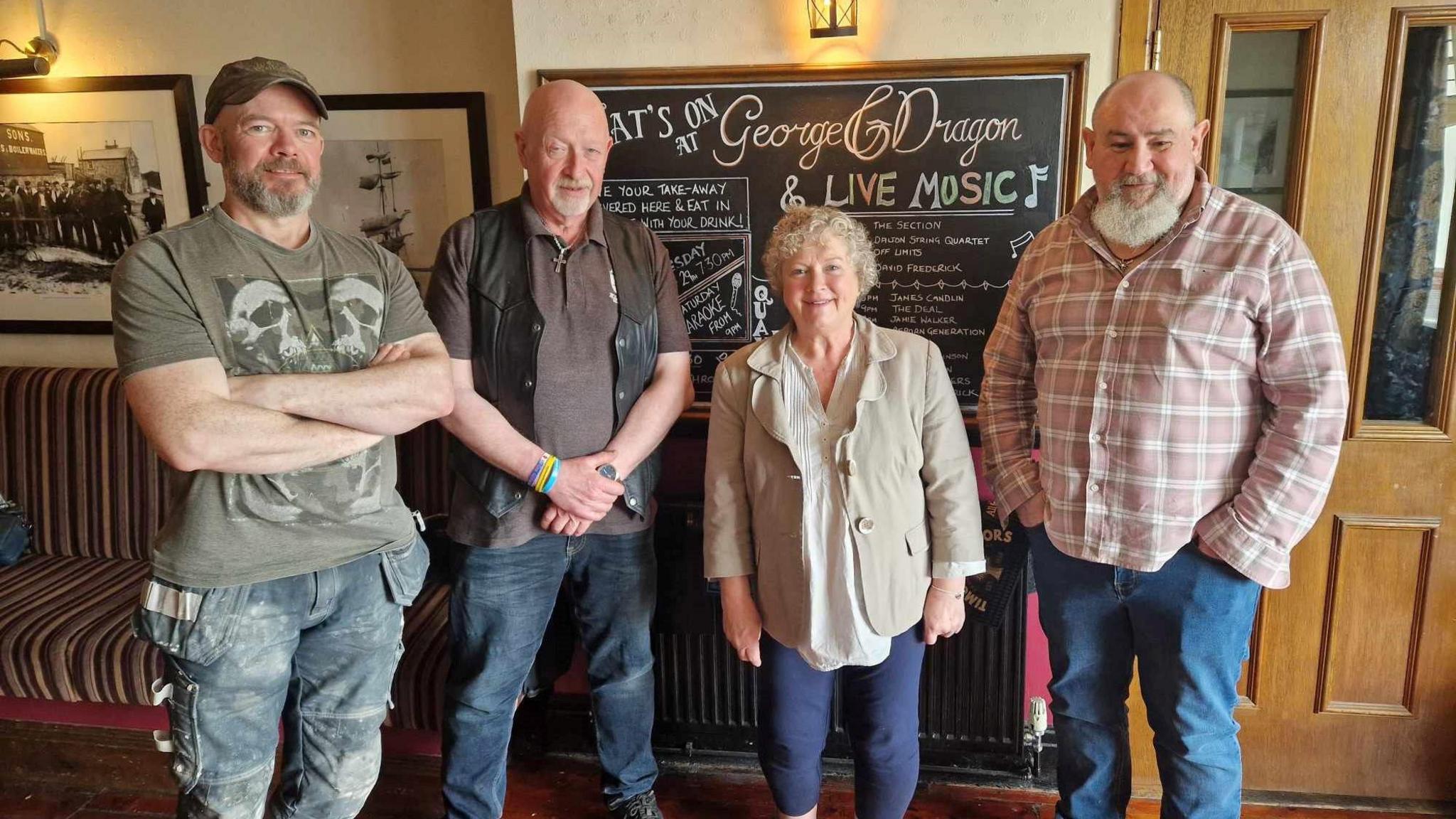 John Rawcliffe with friends in a pub