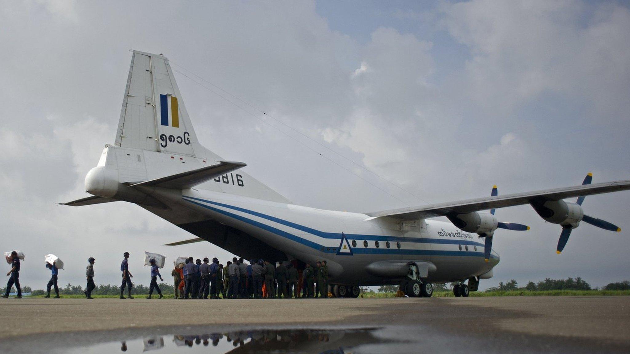 A Myanmar Air Force Shaanxi Y-8 transport aircraft being unloaded at Sittwe airport in Rakhine state, of the same type as the plane that is missing (file photo)