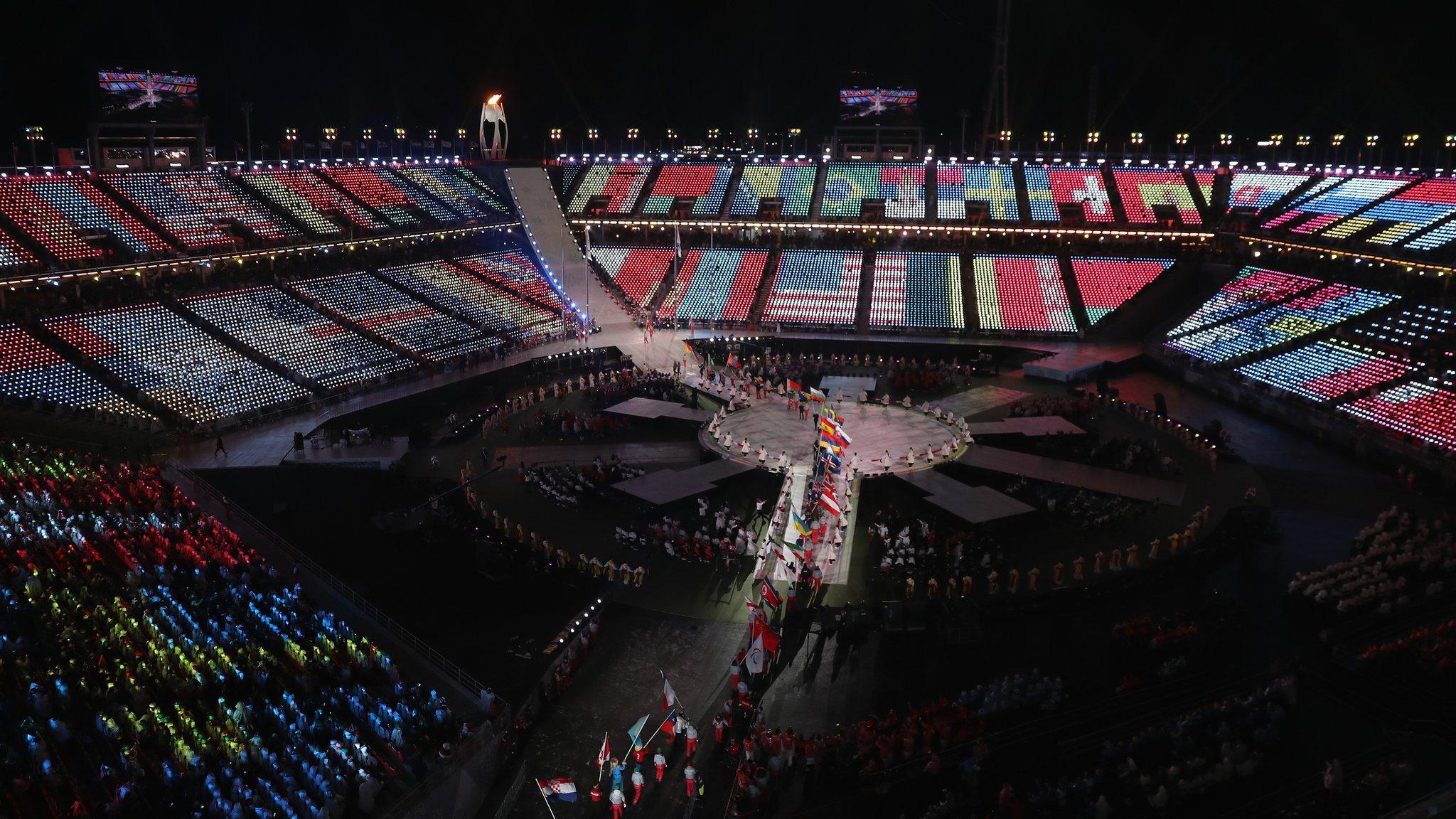 A general view inside the stadium as flagbearers walk through during the closing ceremony of the PyeongChang 2018 Paralympic Games at the PyeongChang Olympic Stadium on March 18, 2018 in Pyeongchang-gun, South Korea.