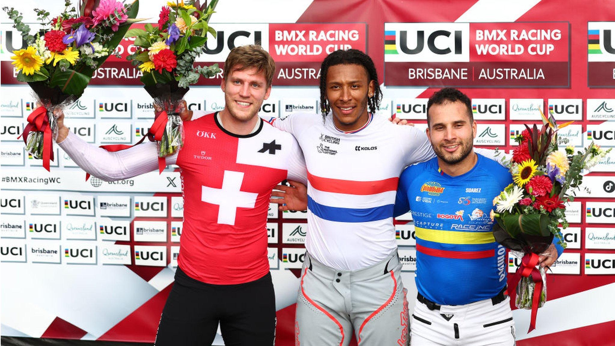 Kye Whyte celebrates winning gold at the BMX Racing World Cup