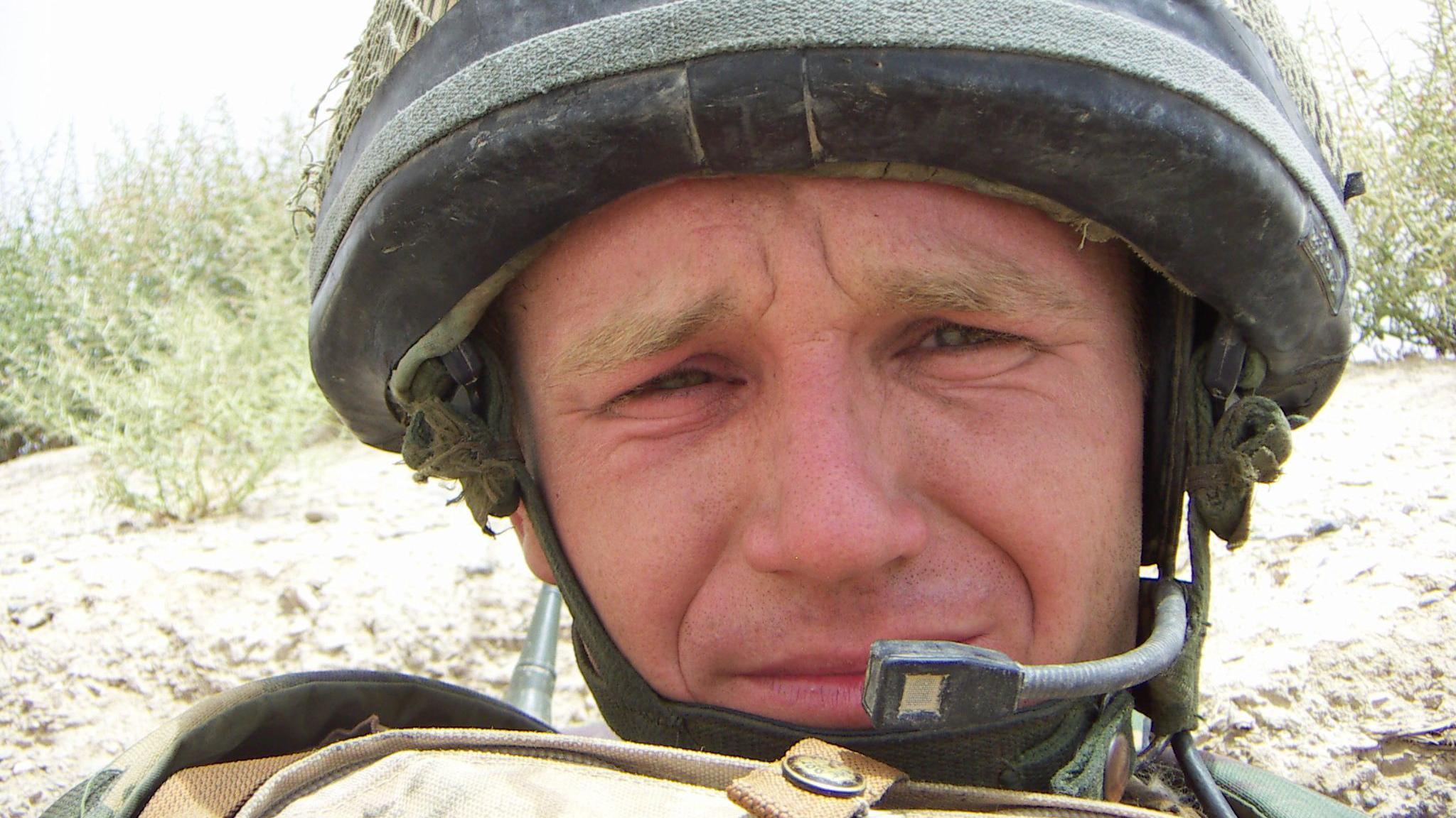 Sgt Peters wearing a helmet in Helmand Province in 2009