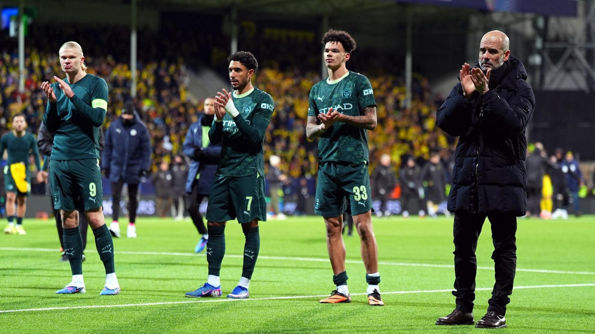 Pep Guardiola and Manchester City players