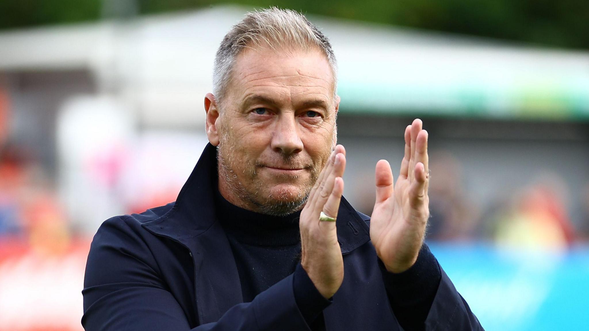 Scott Lindsey applauds the Crawley Town fans