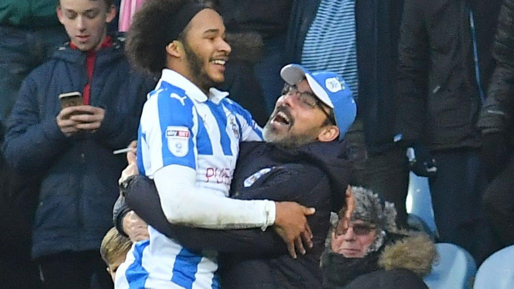 Isaiah Brown and David Wagner celebrate