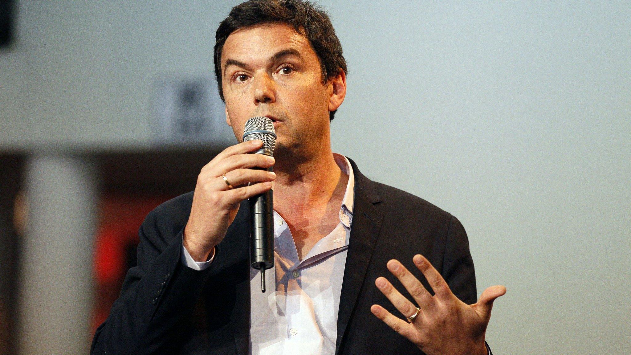 Thomas Piketty with microphone