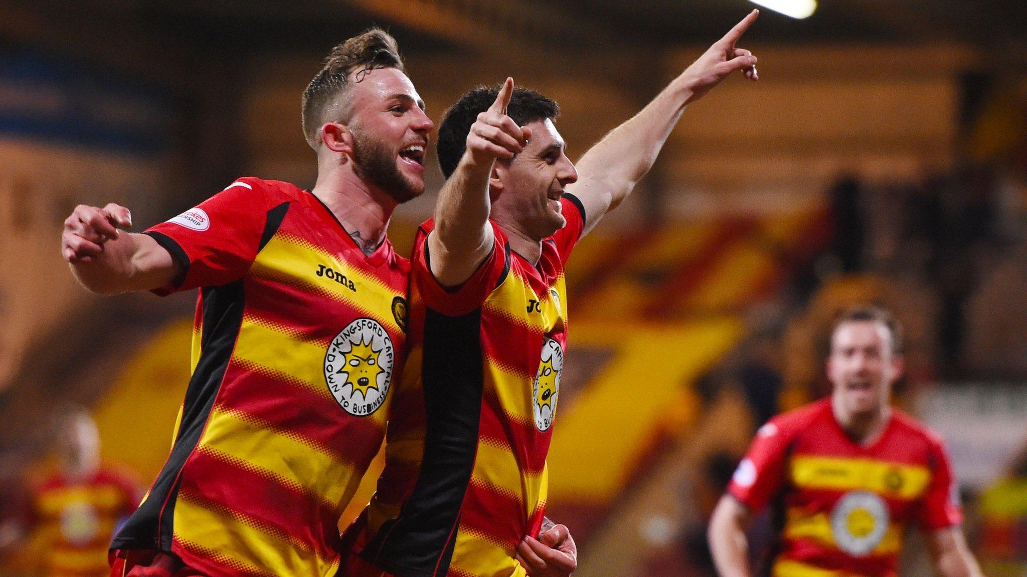 Partick's Kris Doolan (centre) celebrates with Christie Elliott after scoring