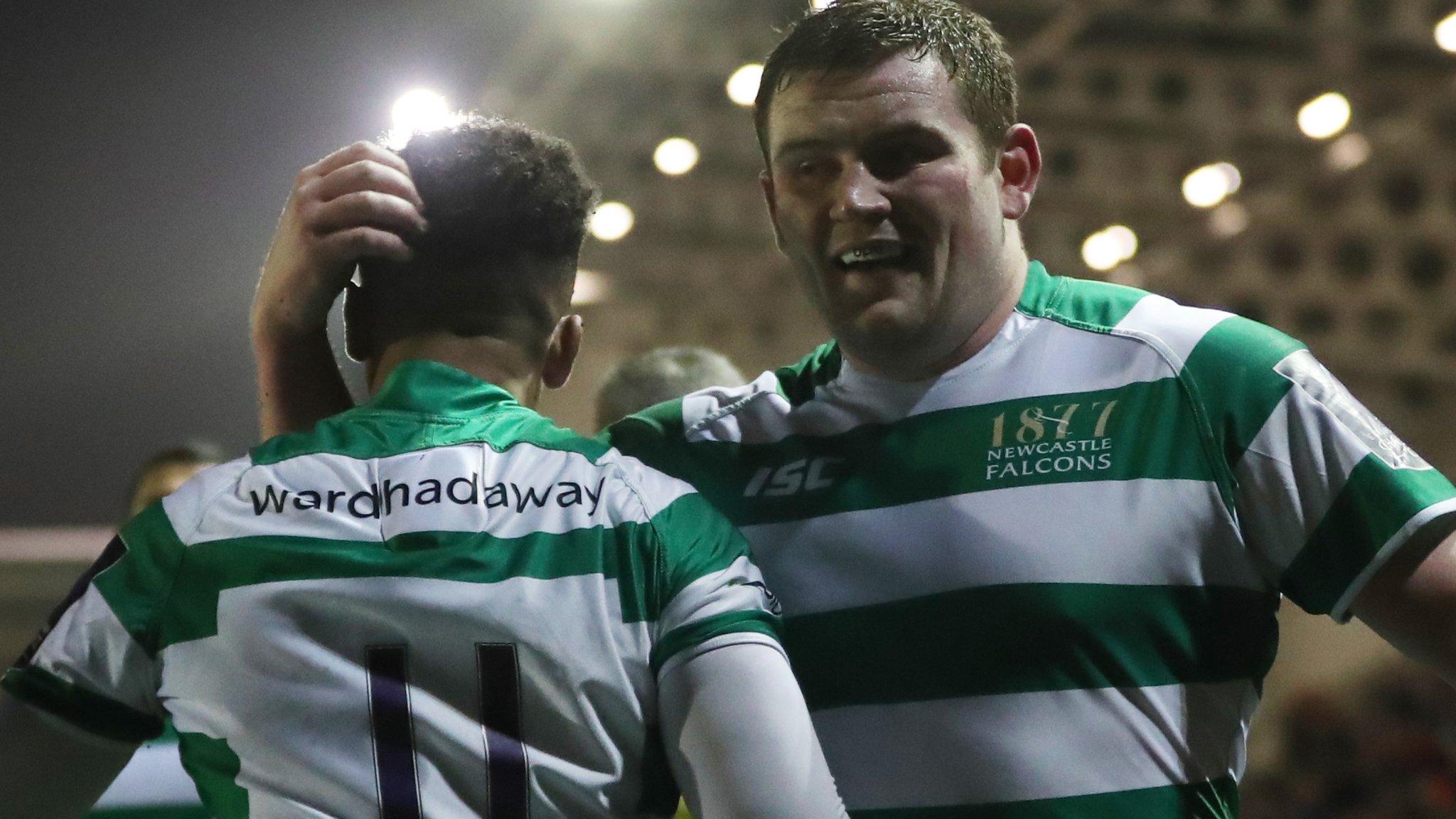 Zach Kibirige and Scott Wilson celebrate a try