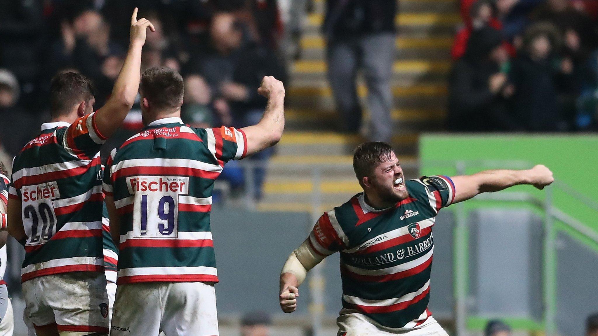 Leicester Tigers players celebrate victory over Munster