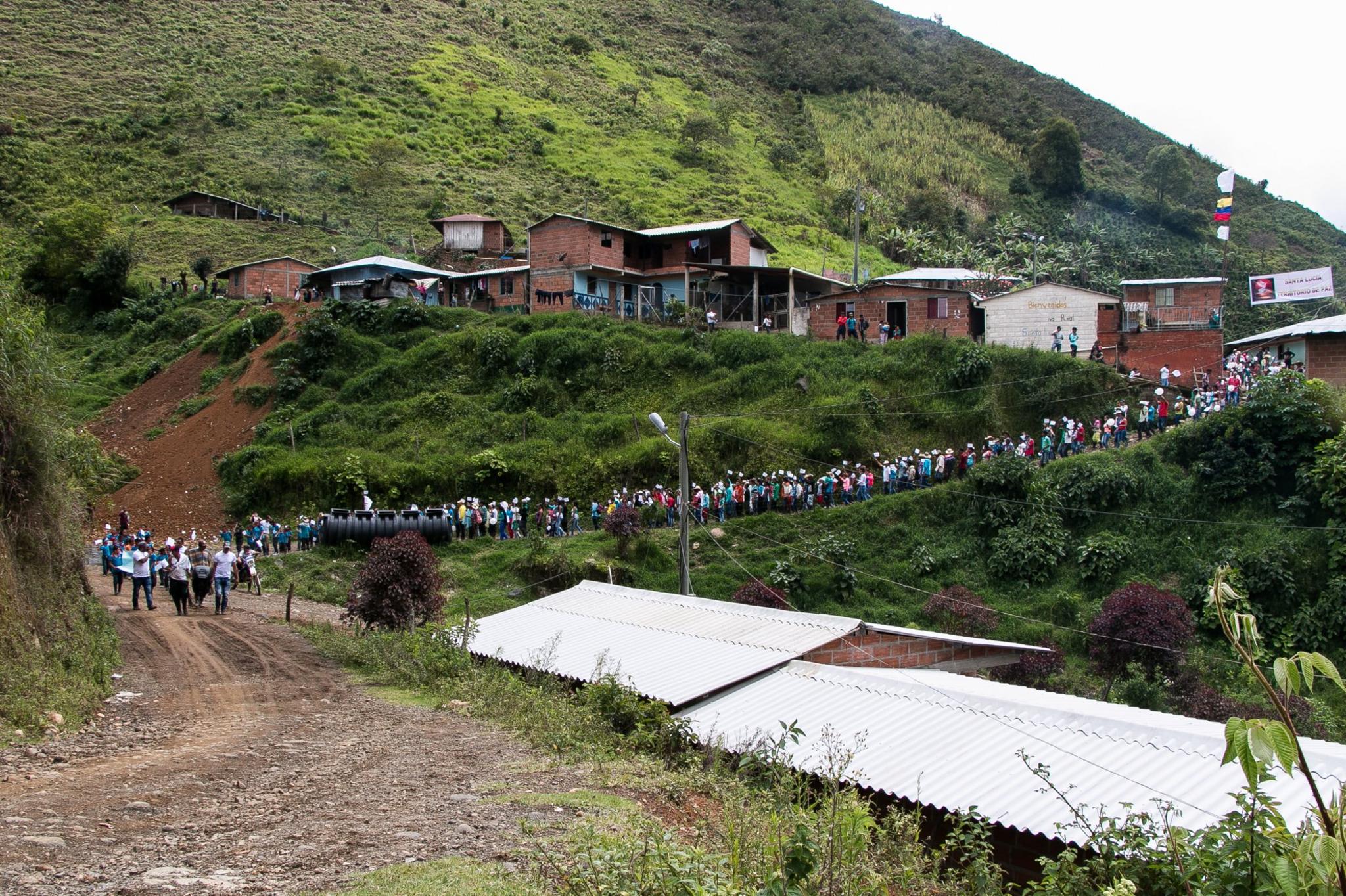 Santa Lucia residents march in support of the peace accords in July 2016