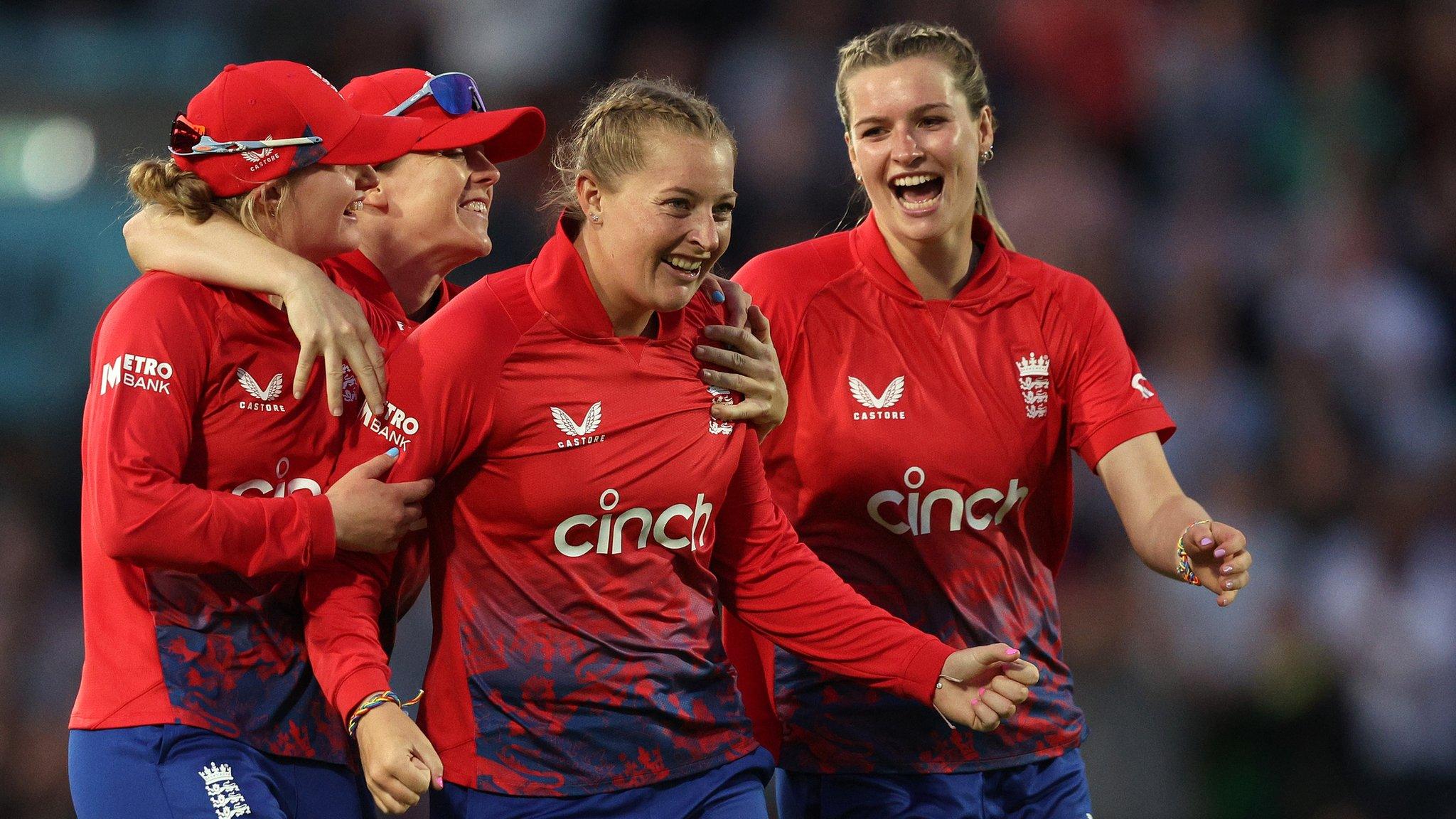 England Women celebrating a wicket against Australia in a T20 match in July