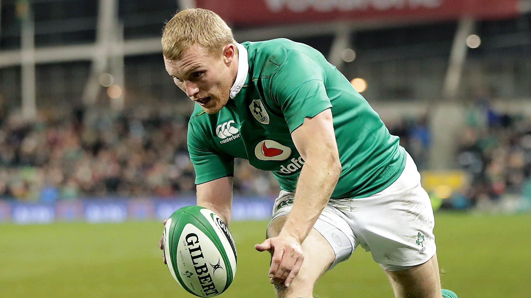 Keith Earls prepares to touch down for the decisive try against Australia