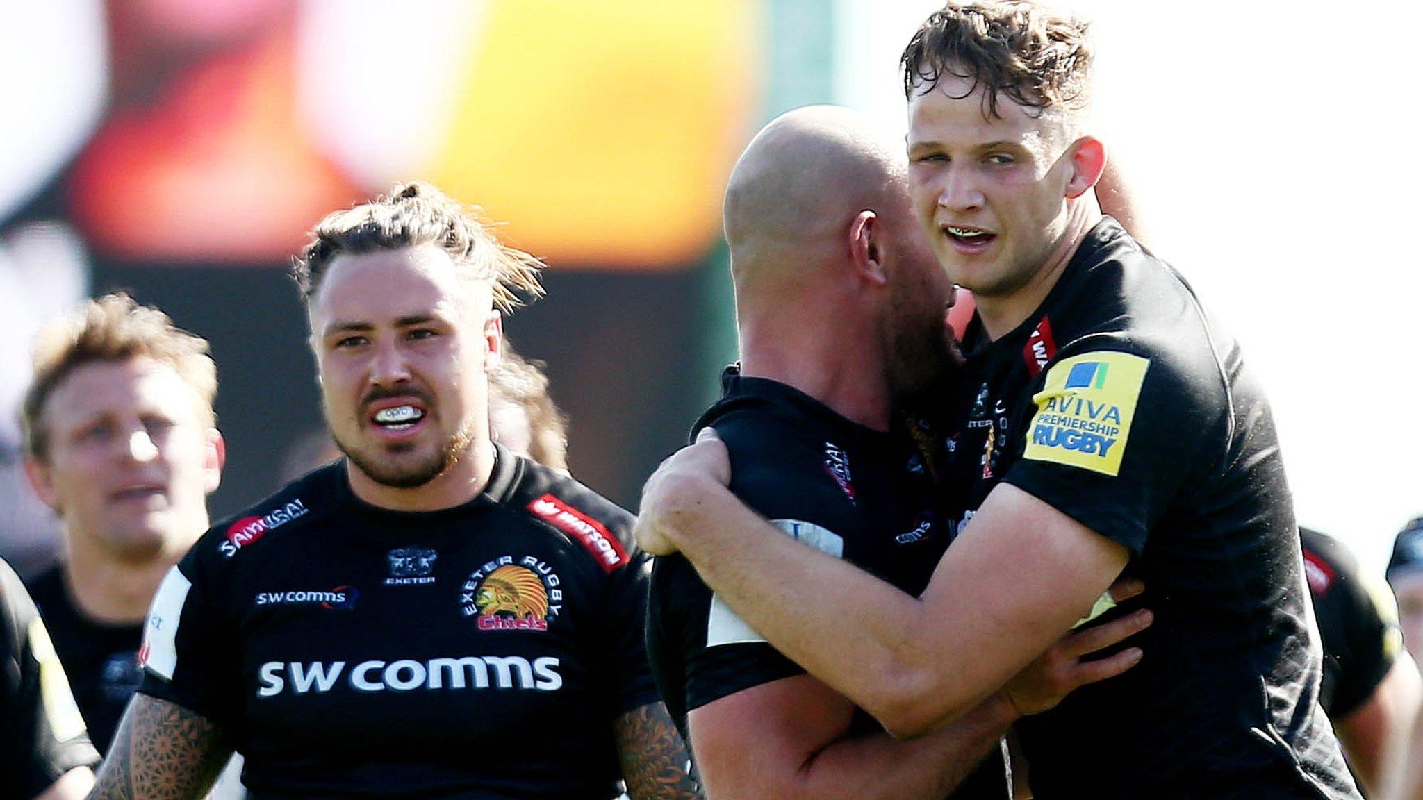 Exeter players celebrate victory over Newcastle