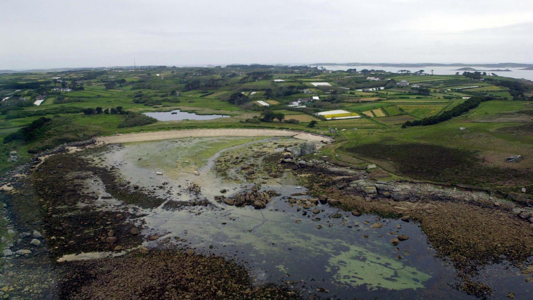 St Mary's on the Isles of Scilly showing a landscape with a body of water in the foreground