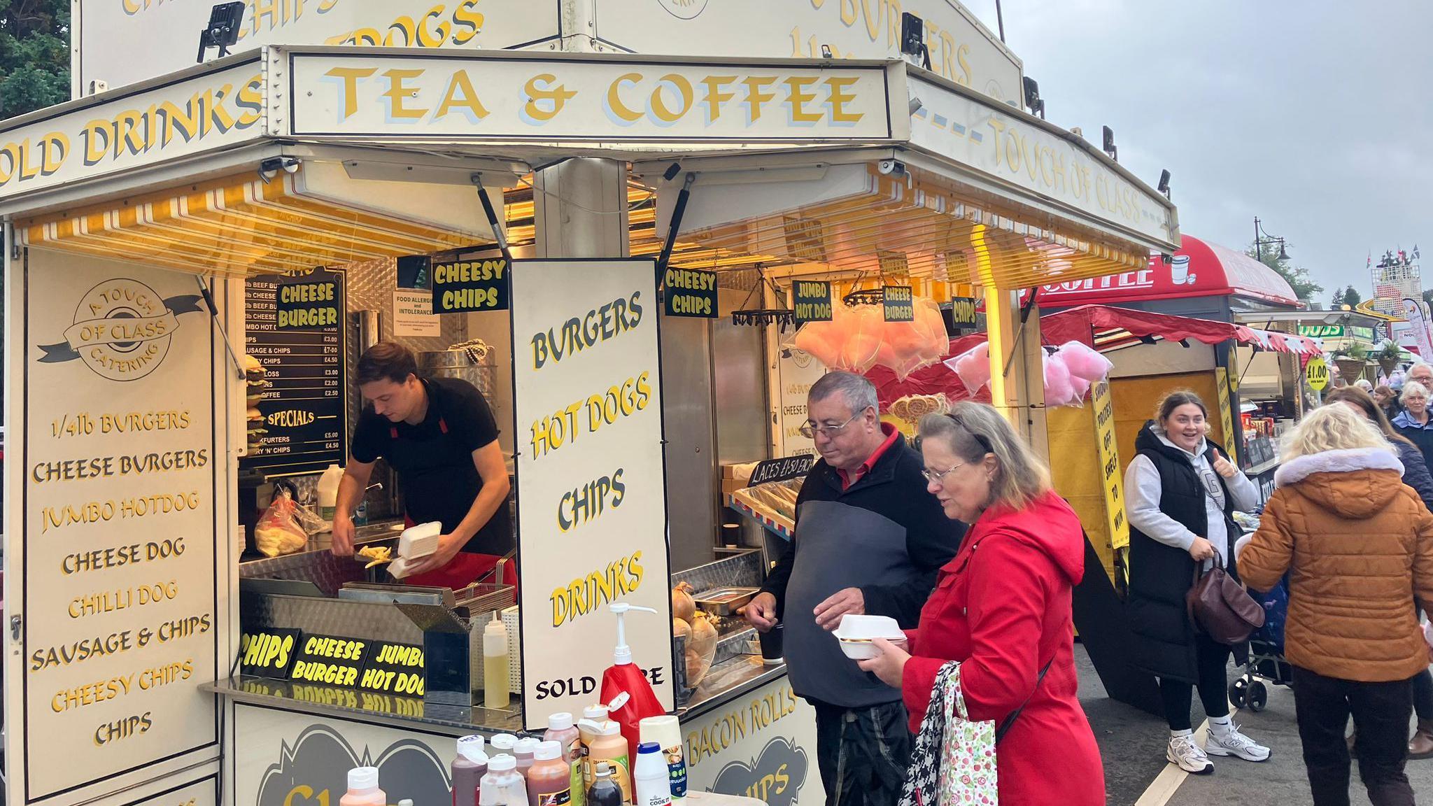 People at a food stall at Tavistock Goose Fair