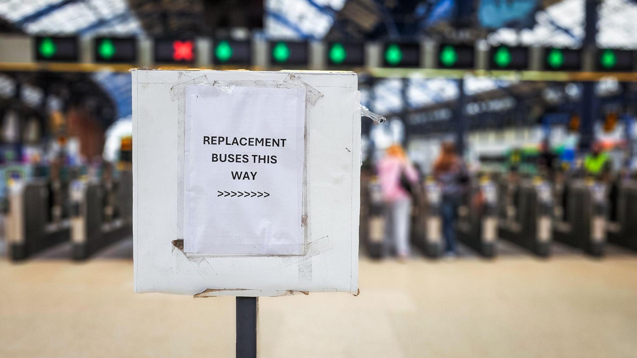 Close up image taken at a train station in southeast England advertising a replacement bus service as the train network has been disrupted due to engineering works.