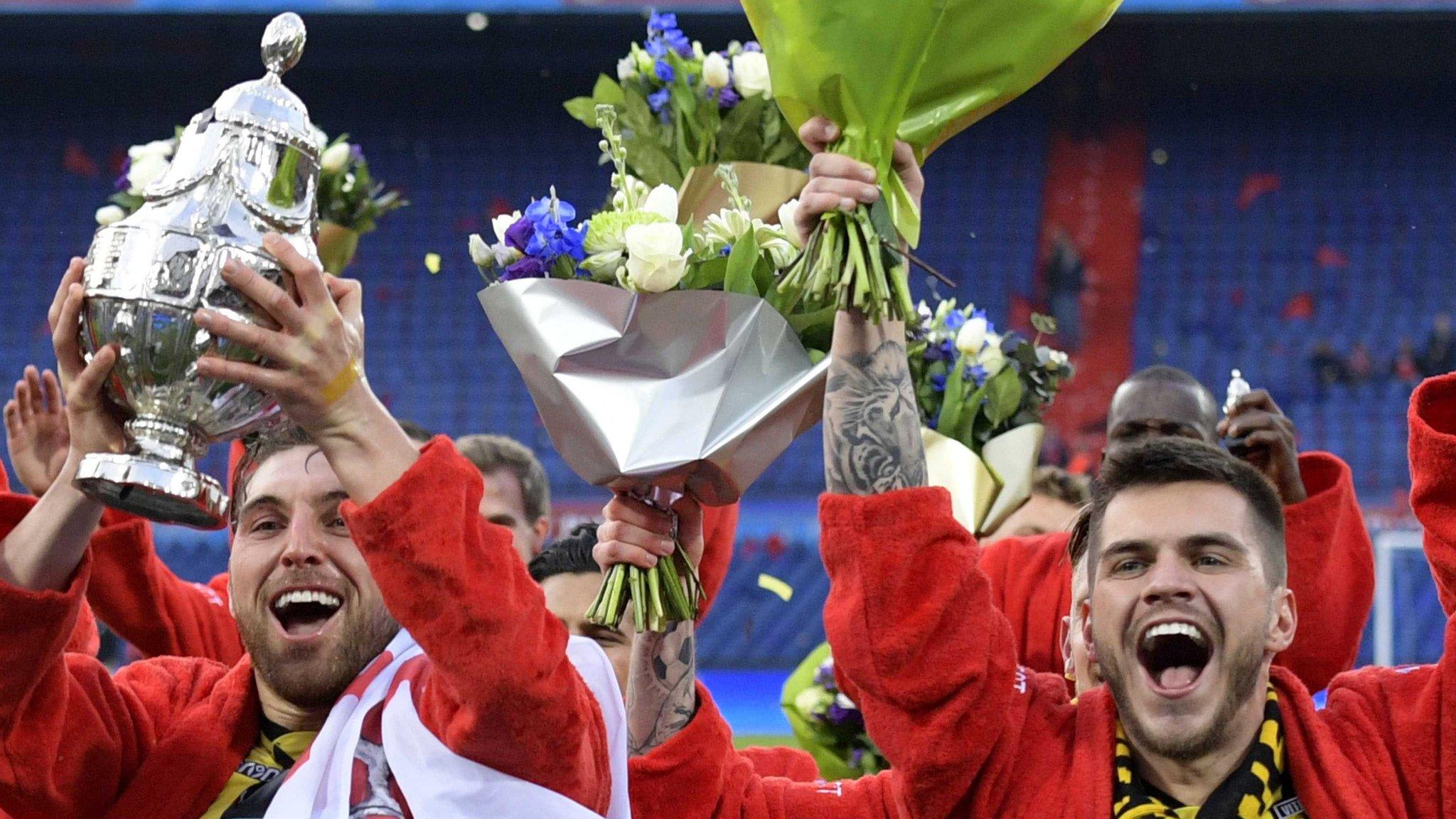 Vitesse Arnhem players celebrate winning the Dutch Cup final