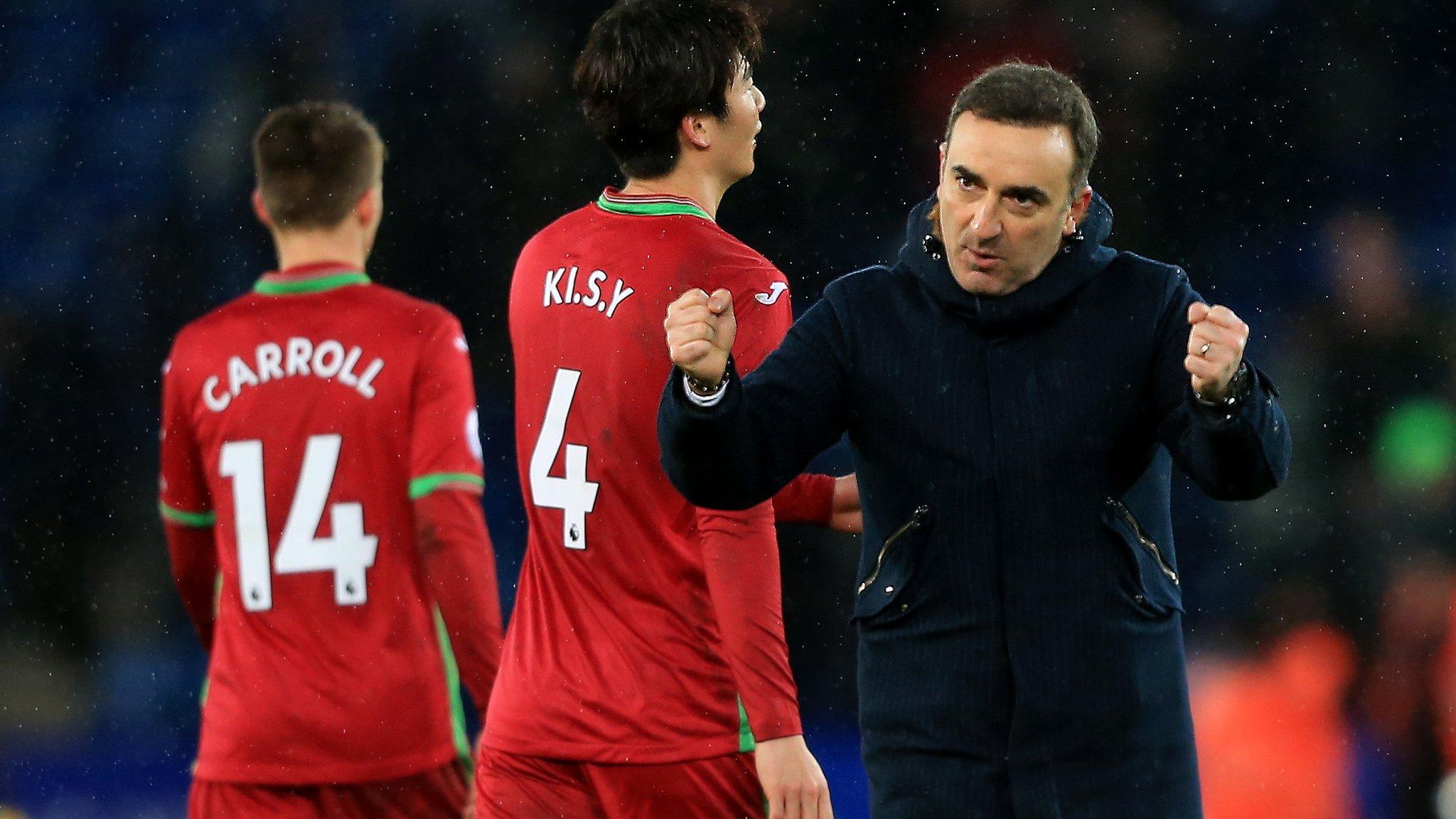 Carlos Carvalhal celebrates Swansea's draw at Leicester