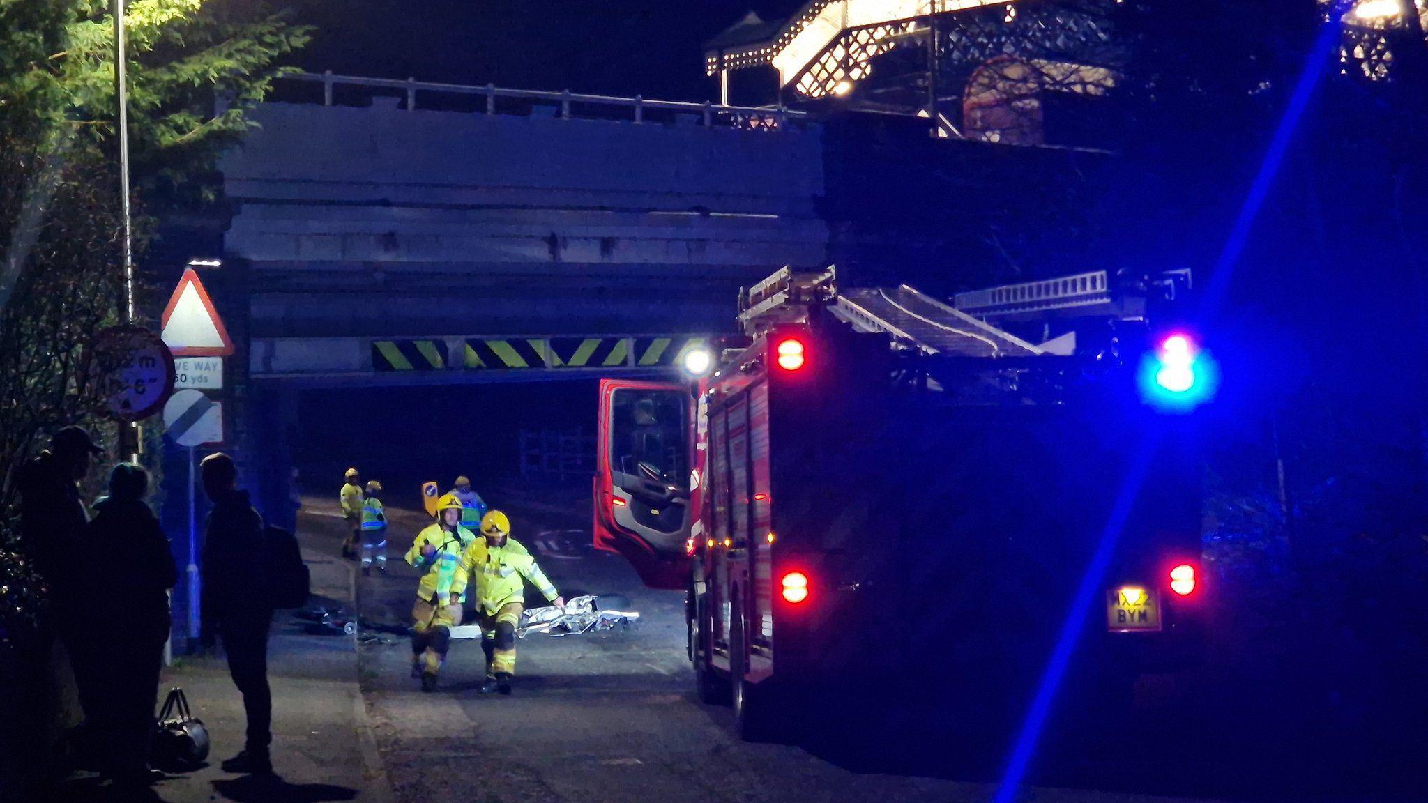 Police and firefighters after the bus crash