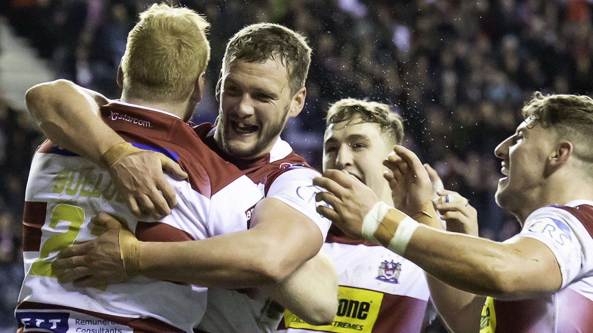 Wigan celebrate a try