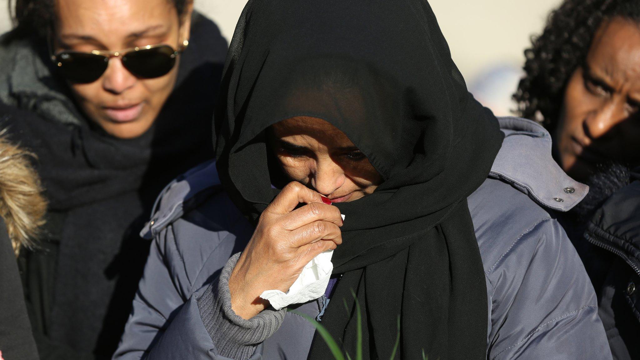 Friends and families of those killed cry during a vigil at Nathan Philips Square in Toronto, Ontario, Canada, on March 23, 2019 for the victims of the Ethiopian Airlines Flight 302 plane crash