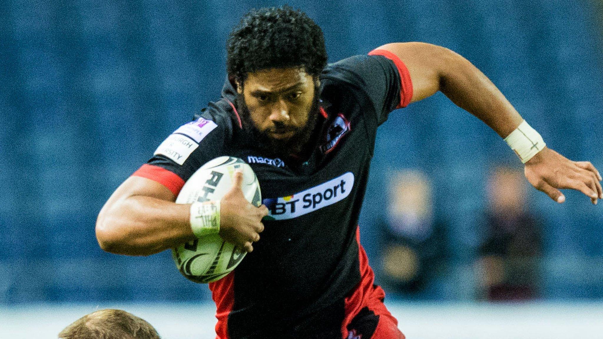 Sasa Tofilau runs with the ball for Edinburgh in their pre-season match against Newcastle