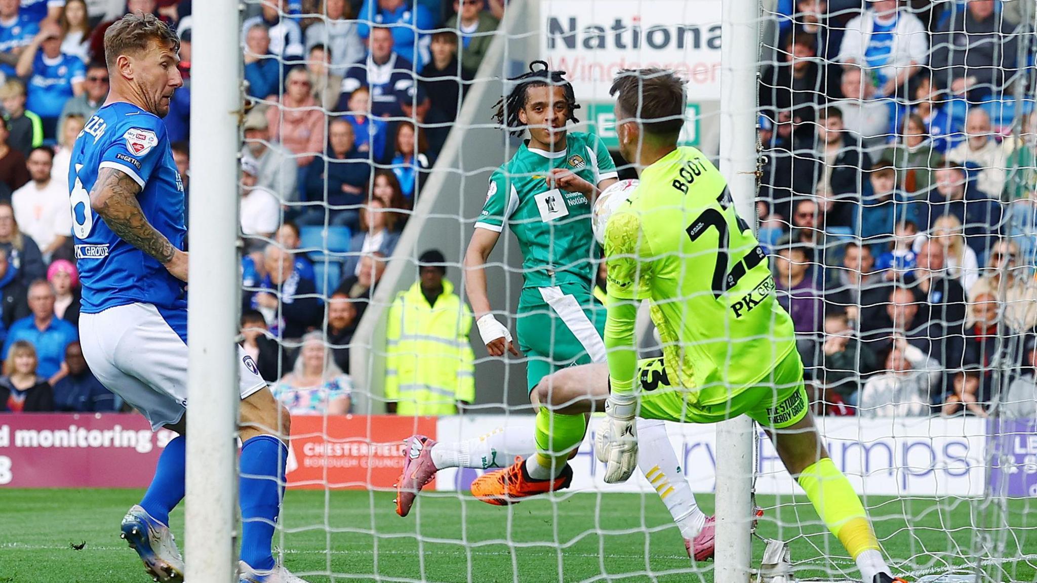 Chesterfield goalkeeper Ryan Boot can not keep Jayden Luker's shot from crossing the line for Notts County