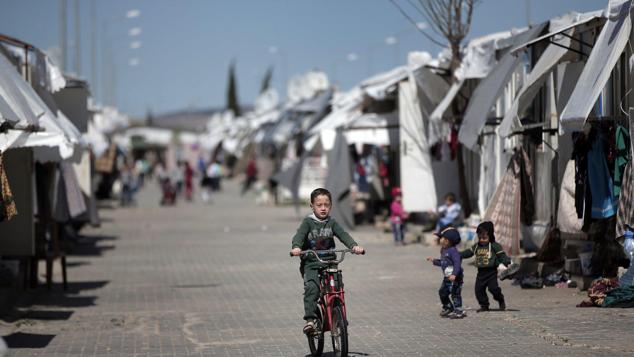 Oncupinar camp for Syrian refugees next to border crossing with Syria, near the town of Kilis in south-eastern Turkey, Thursday, March 17, 2016