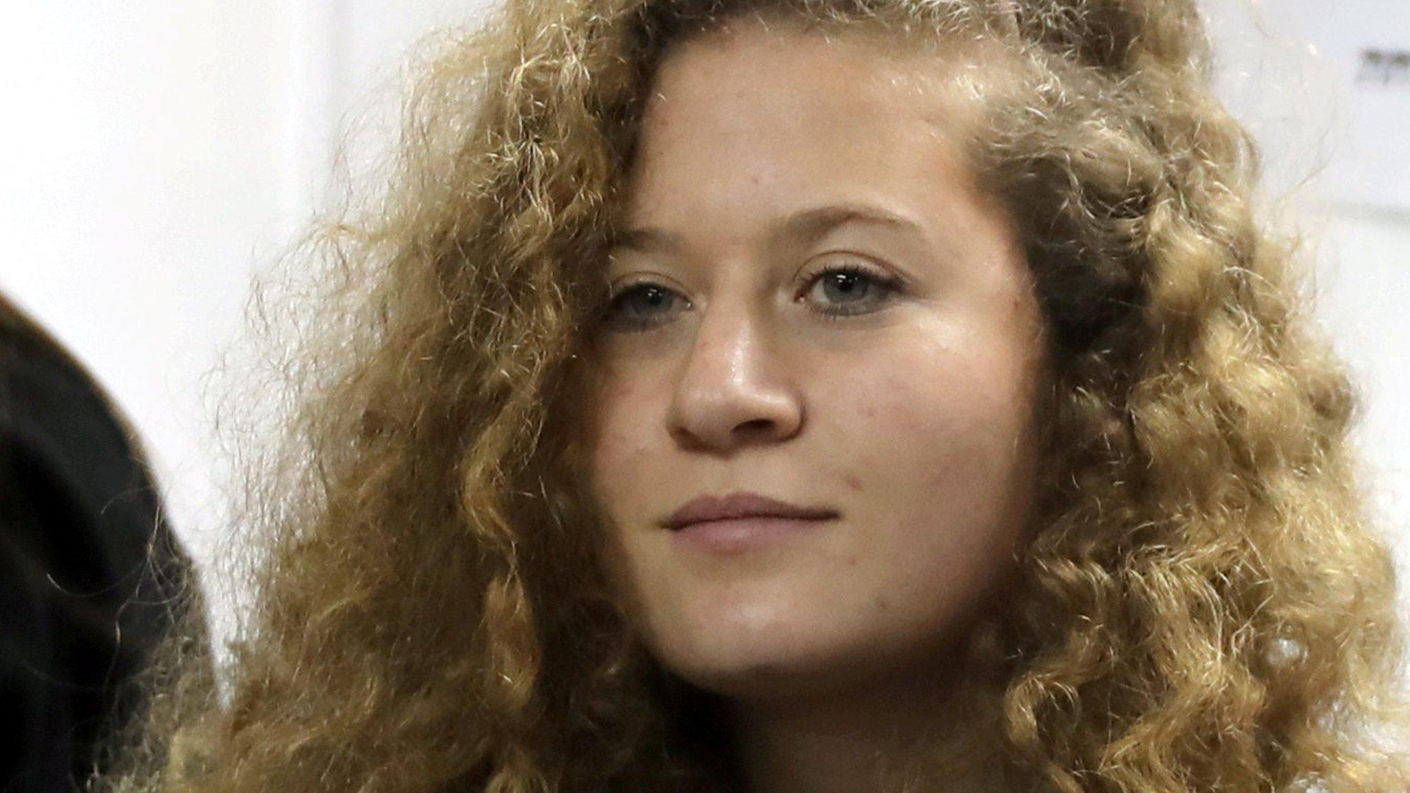 Palestinian teenager Ahed Tamimi enters a military court at Ofer prison, near the West Bank city of Ramallah, on 13 February 2018