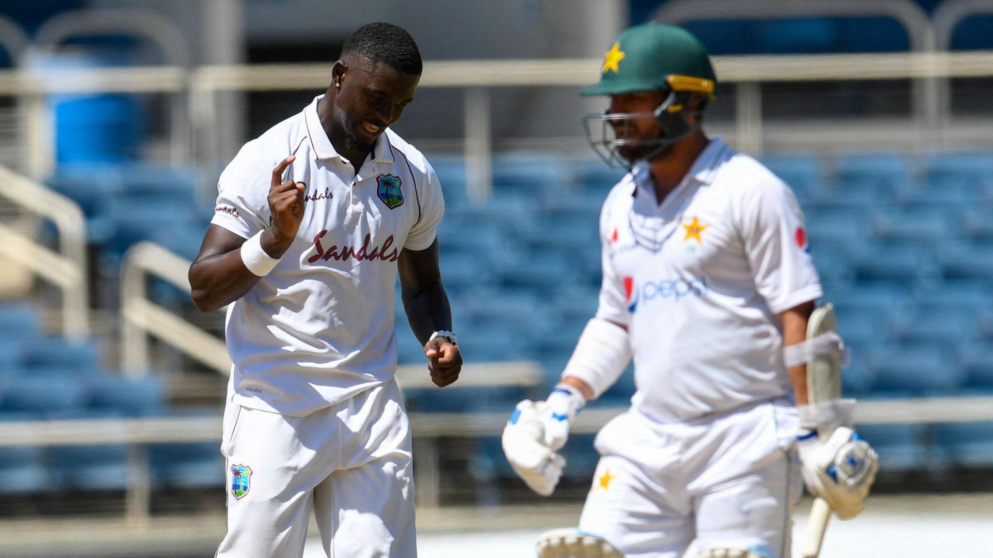 West Indies' Jayden Seales and Pakistan's Yasir Shah