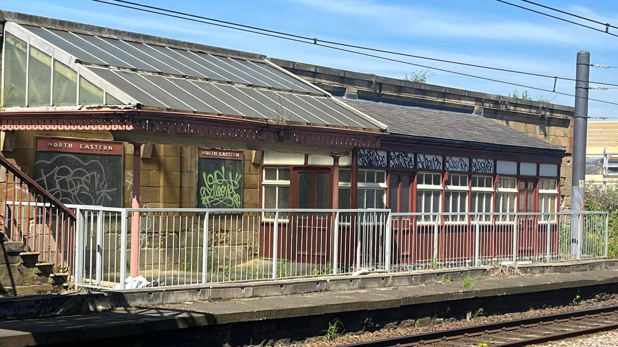 Graffiti on the platform opposite the museum