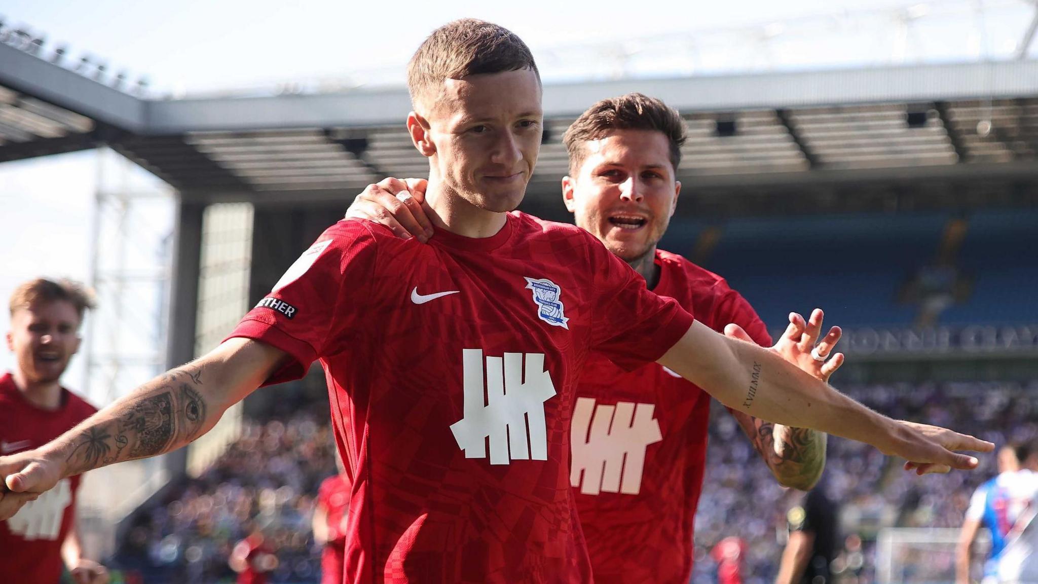 Birmingham striker Jay Stansfield celebrating after scoring.