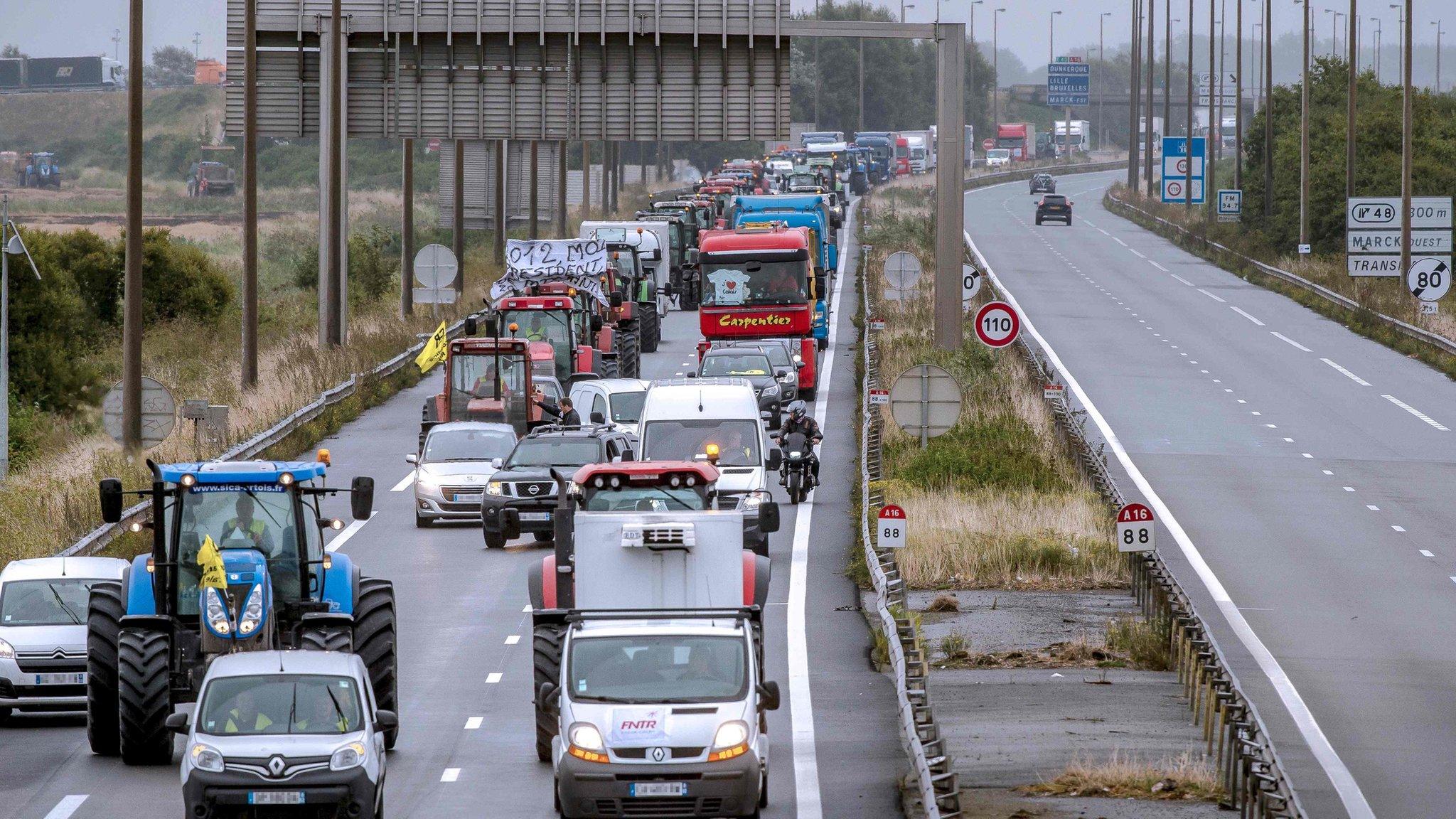 Tractors and lorries on A16 motorway near Calais