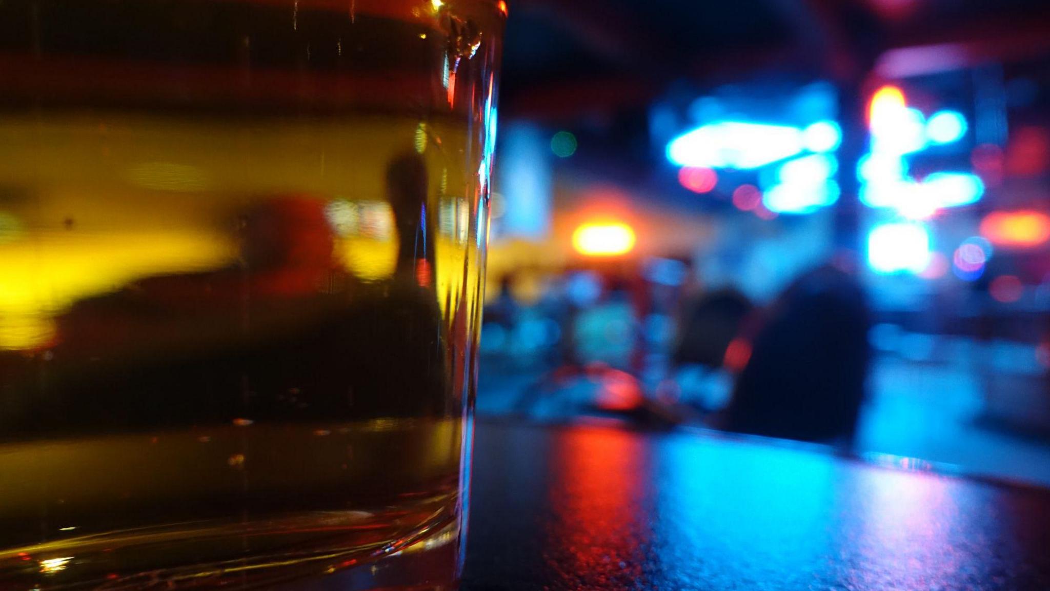 A beer glass in a bar