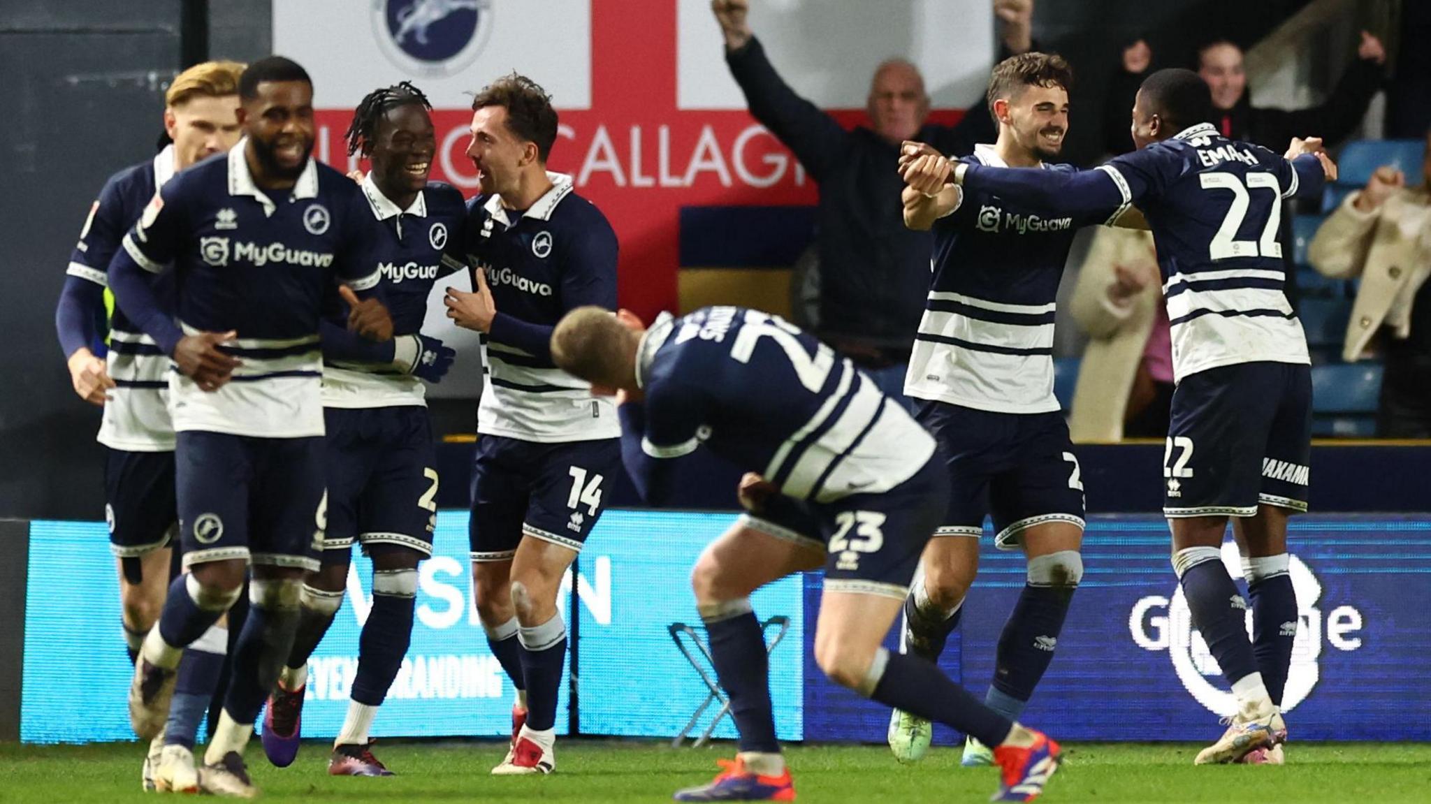 Millwall players celebrate late winner against Blackburn