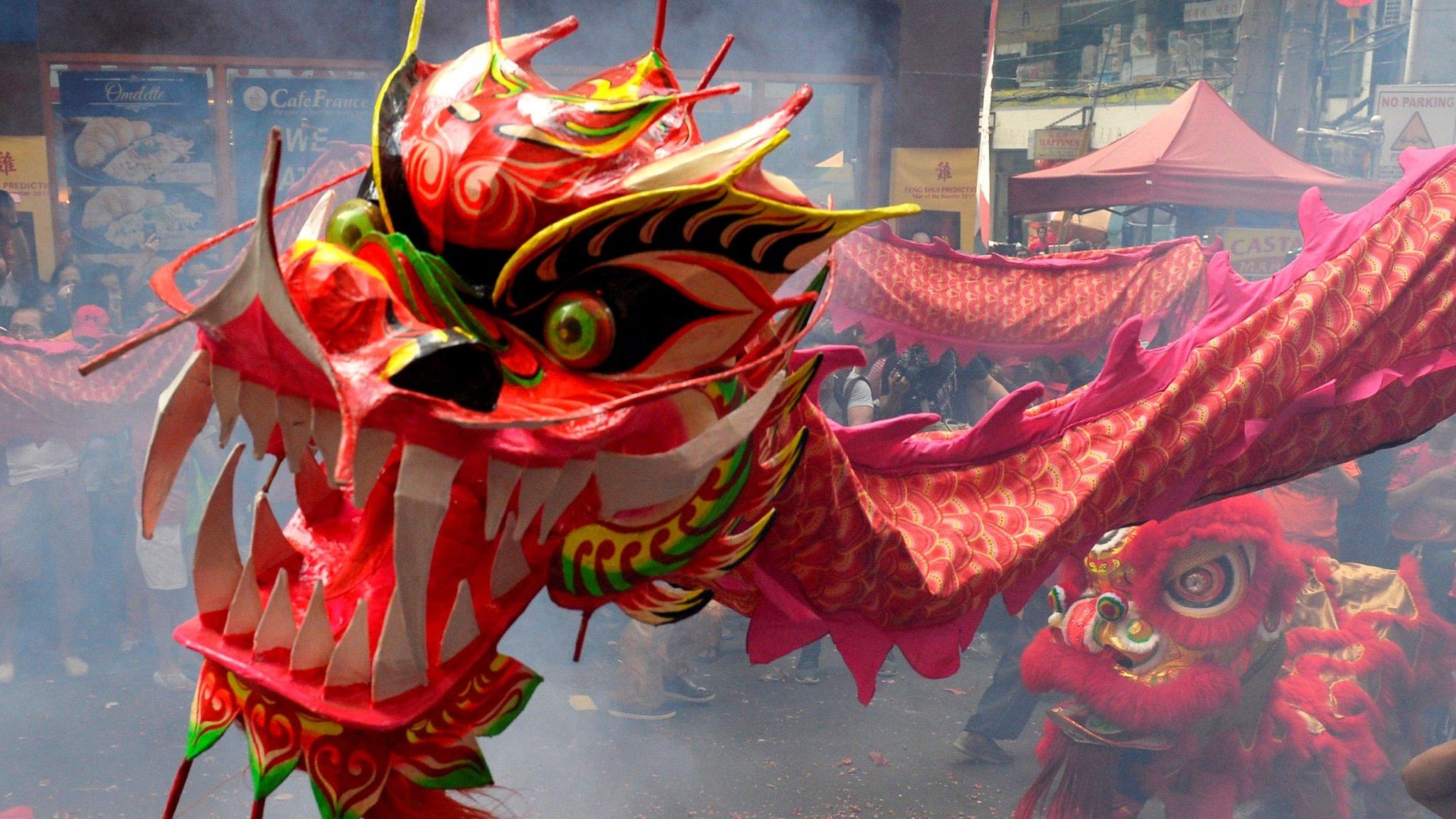 Chinese New Year is on 28 January. People celebrate with fireworks, giving gifts of money in red envelopes, eating special food and performing a lion dance.