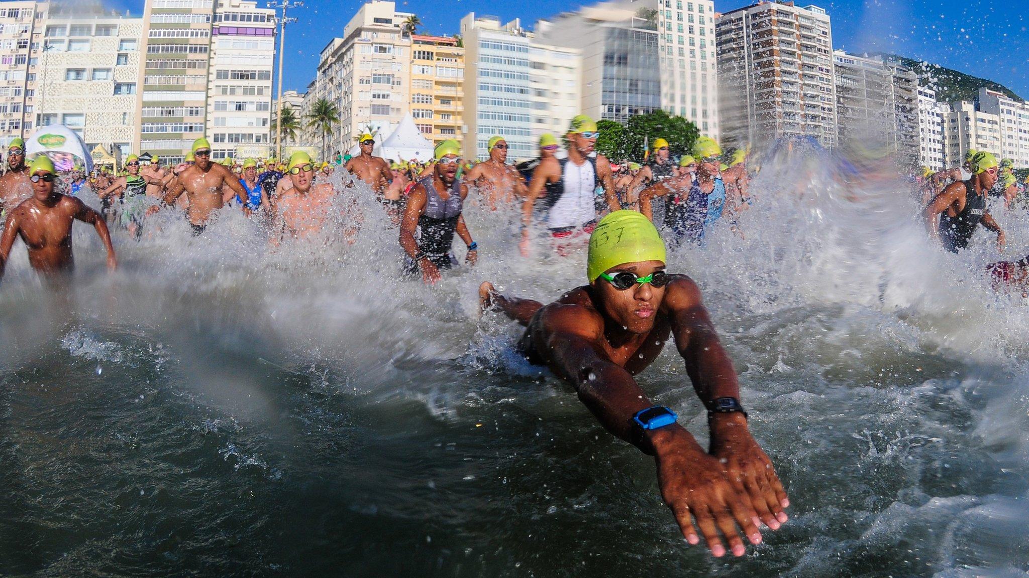 Athletes start swim on Copacabana beach