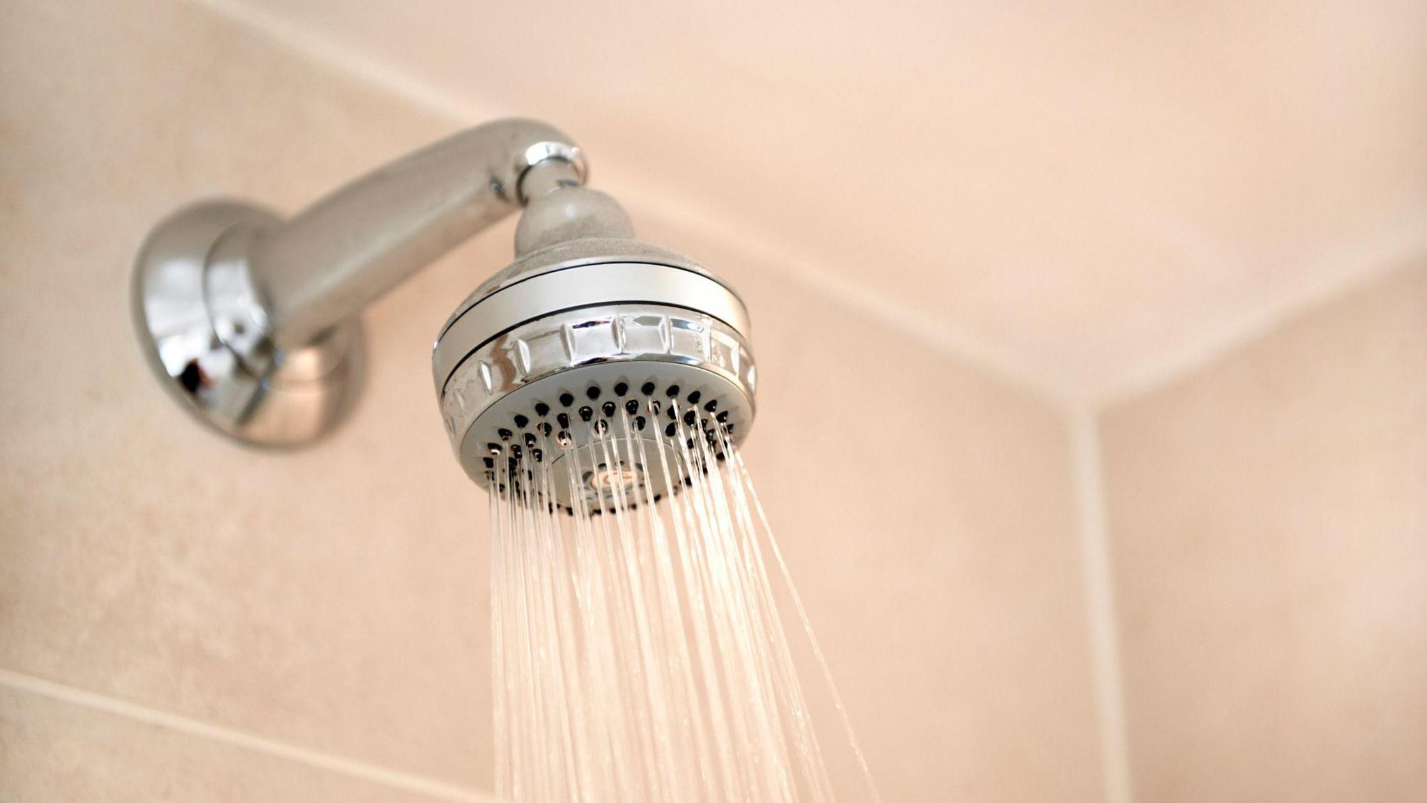 A shower head pouring water
