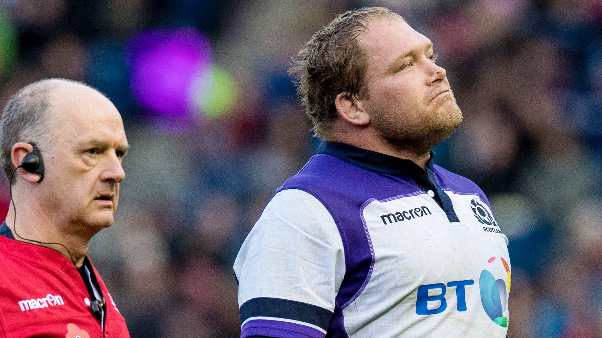 WP Nel departs the action against Samoa, accompanied by Scotland team doctor James Robson