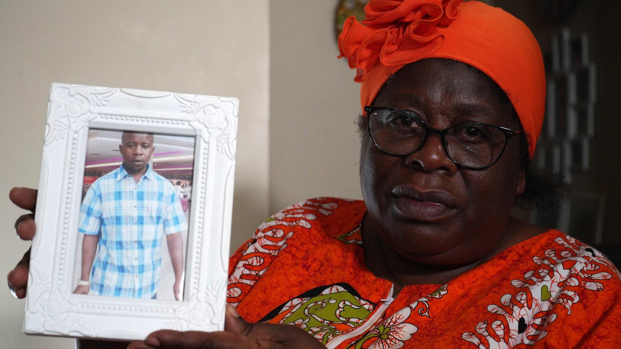 Angelina Patterson with picture of her son Charles