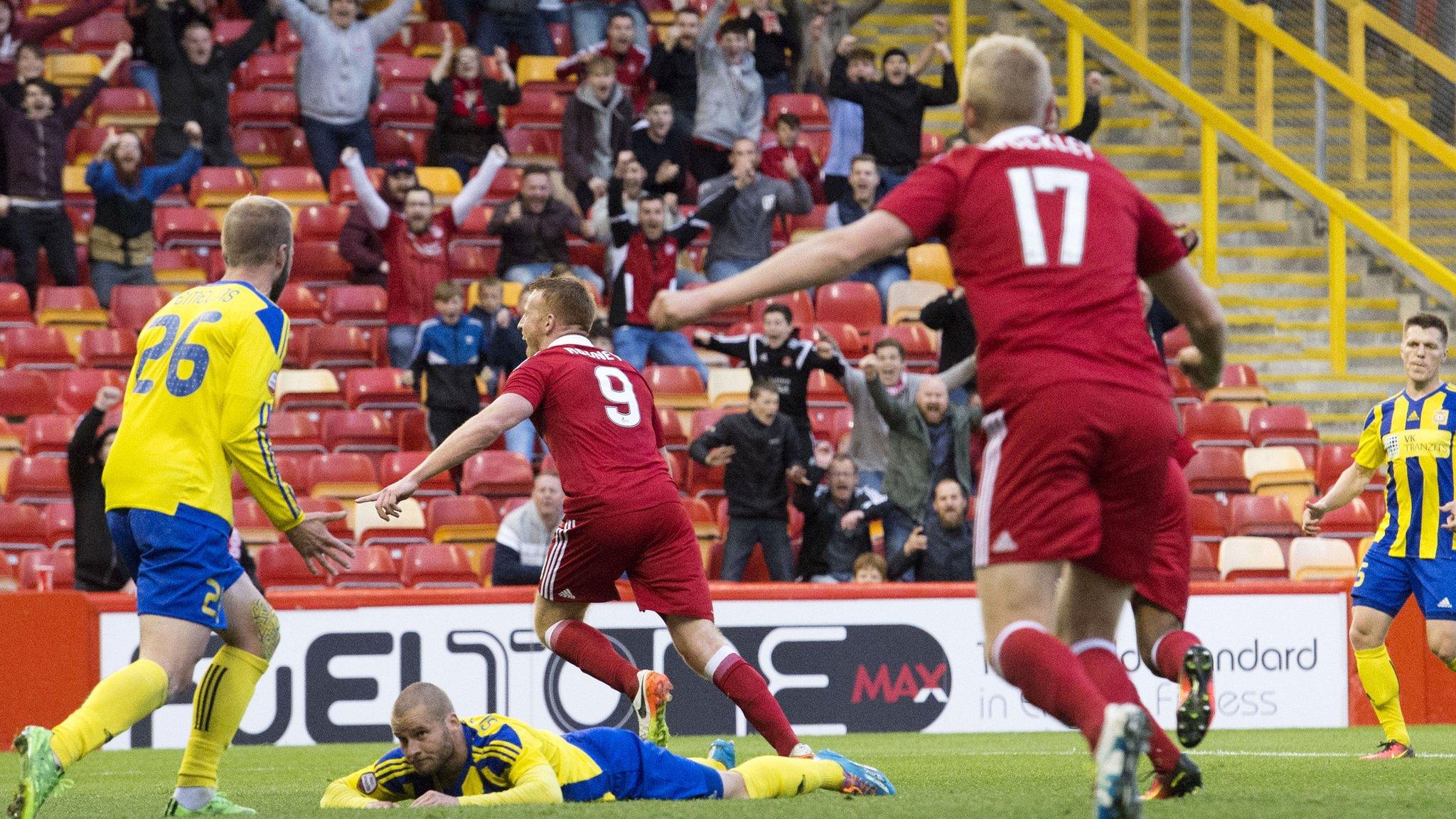 Adam Rooney celebrates after scoring