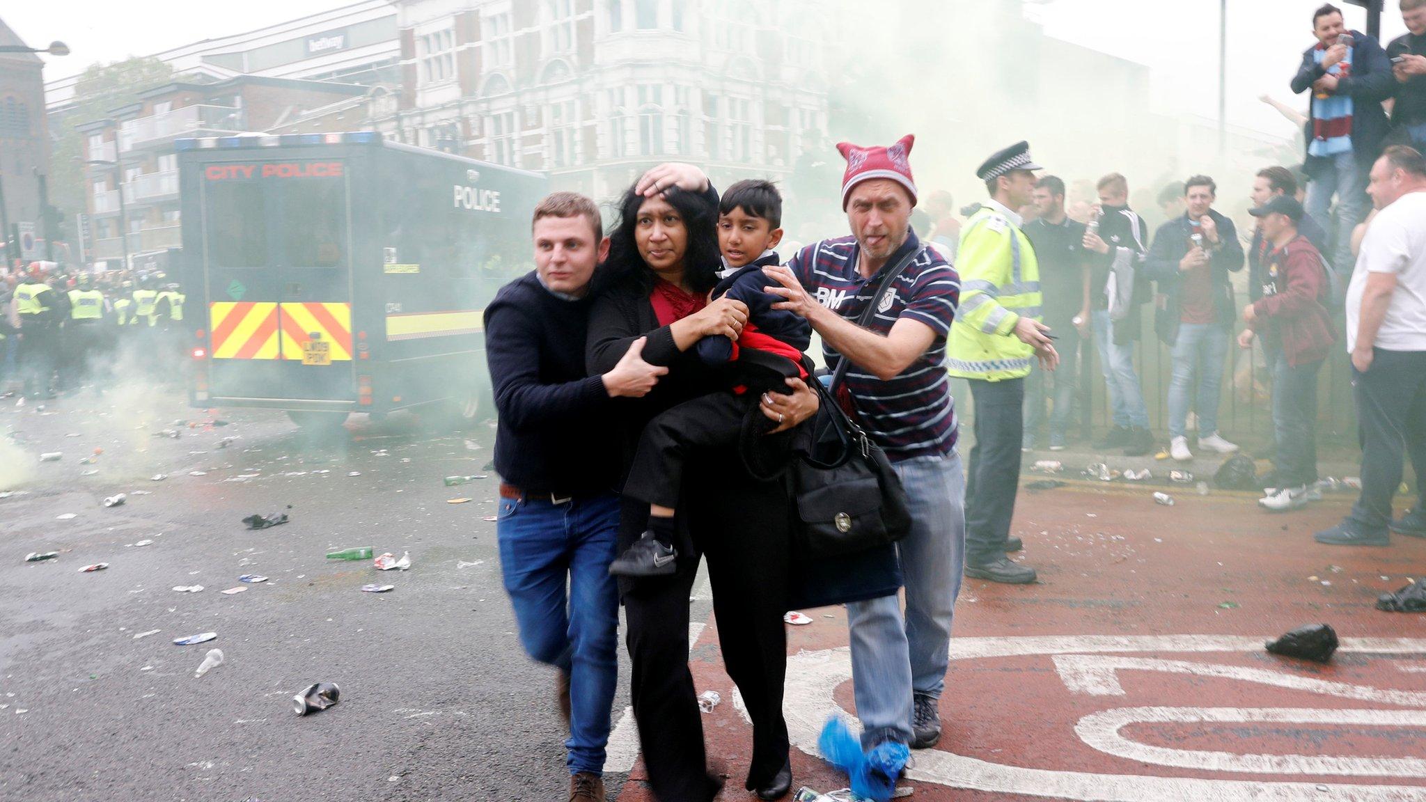 West Ham fans running away