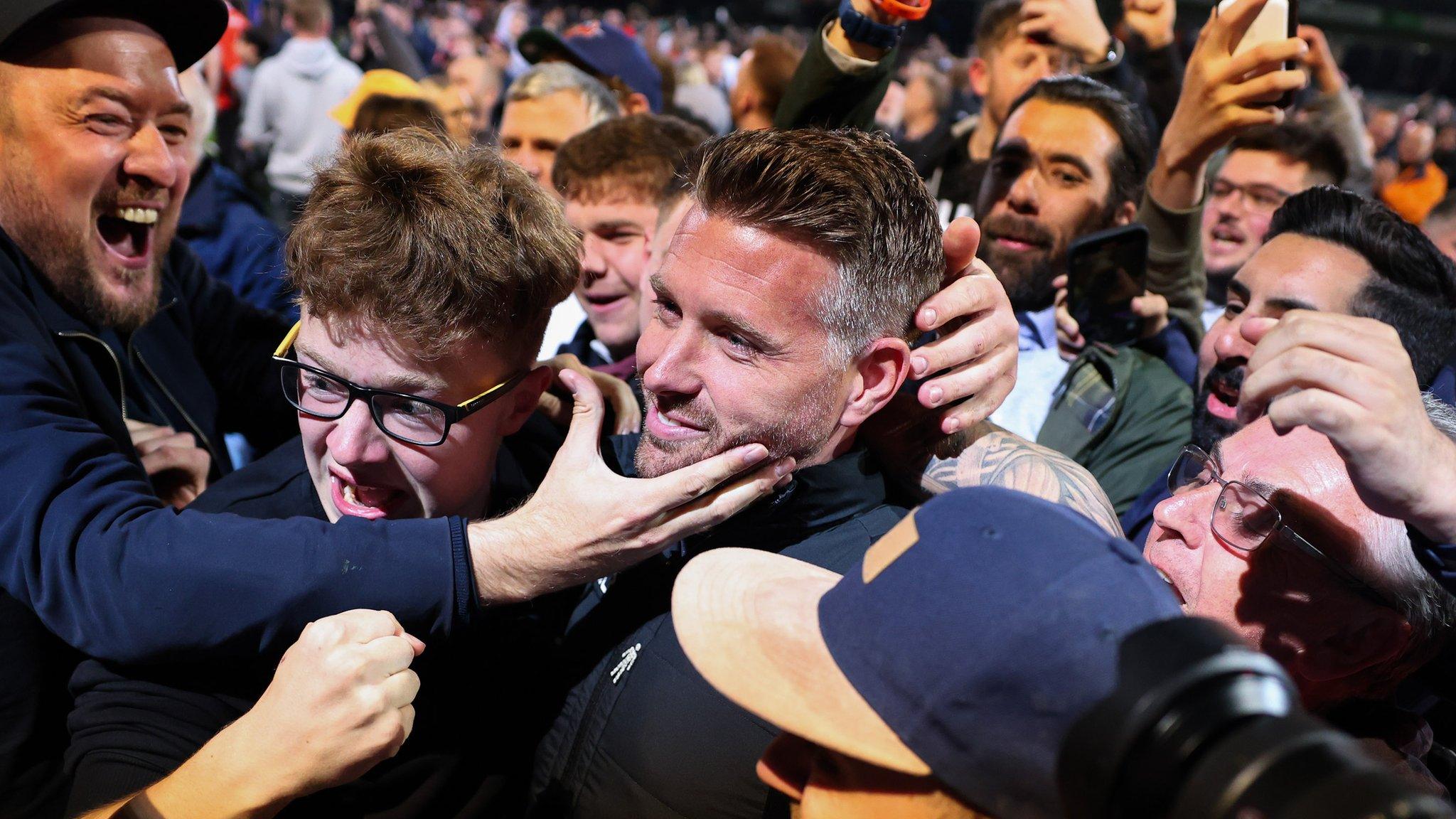 Rob Edwards celebrate with Luton fans