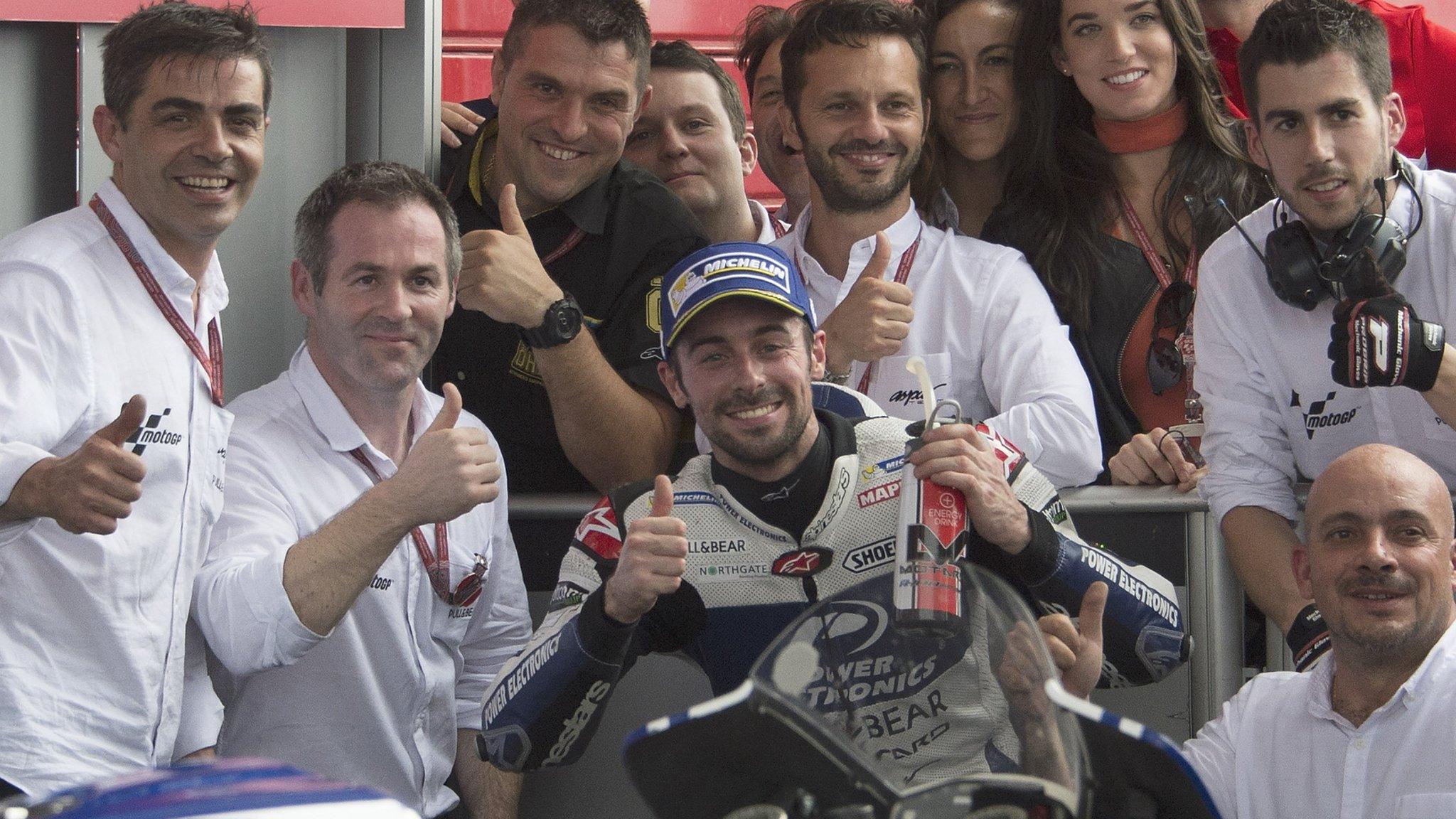 Eugene Laverty celebrates with his team in Argentina