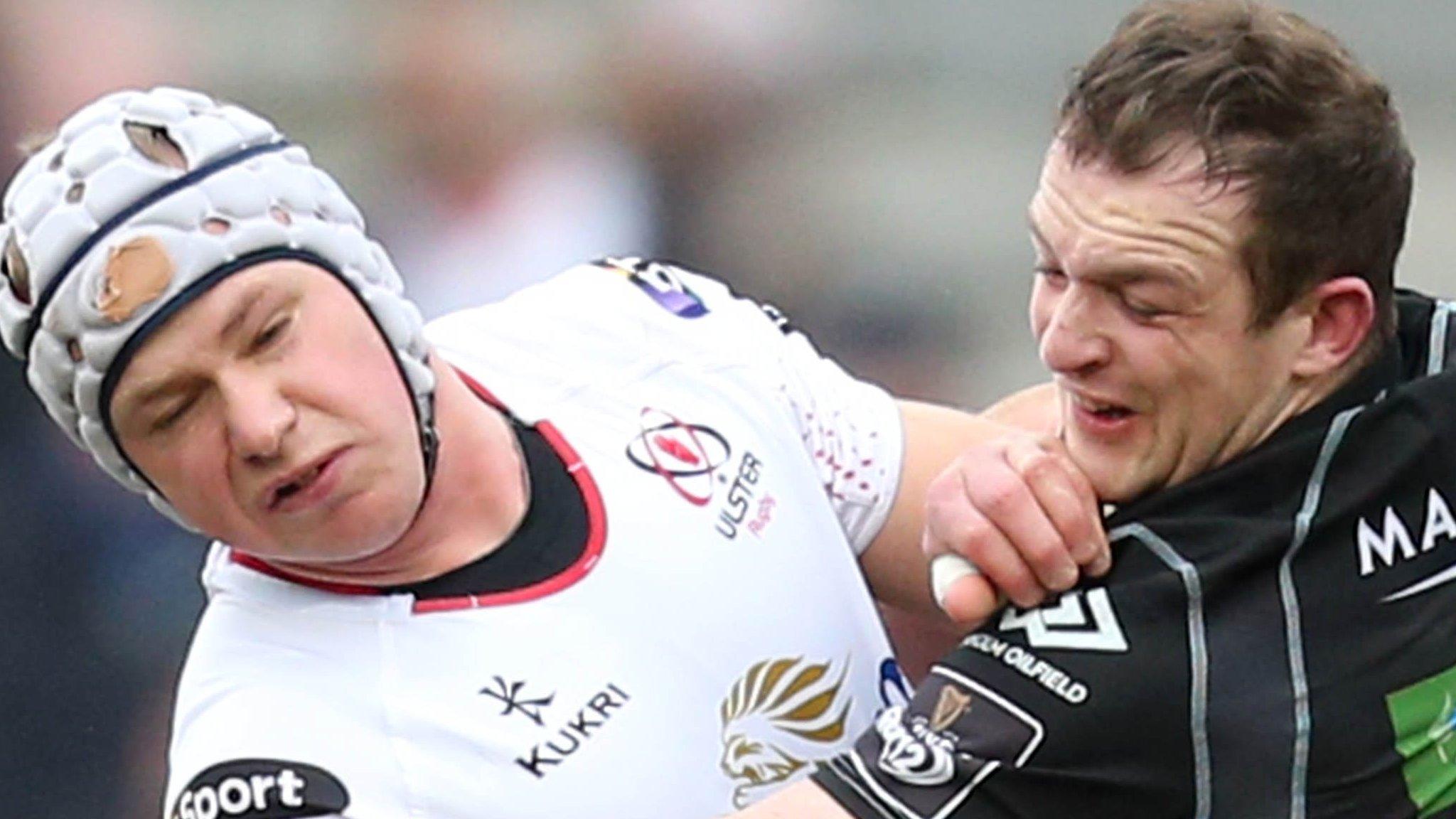 Ulster’s Luke Marshall is tackled by Nick Grigg of Glasgow