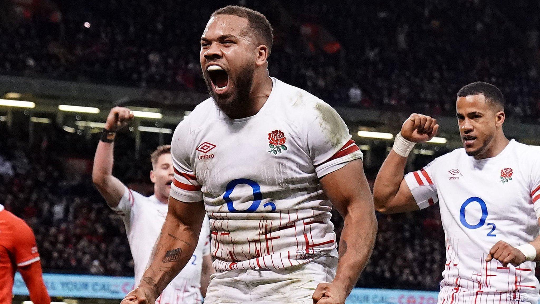 Ollie Lawrence celebrates scoring England's third try