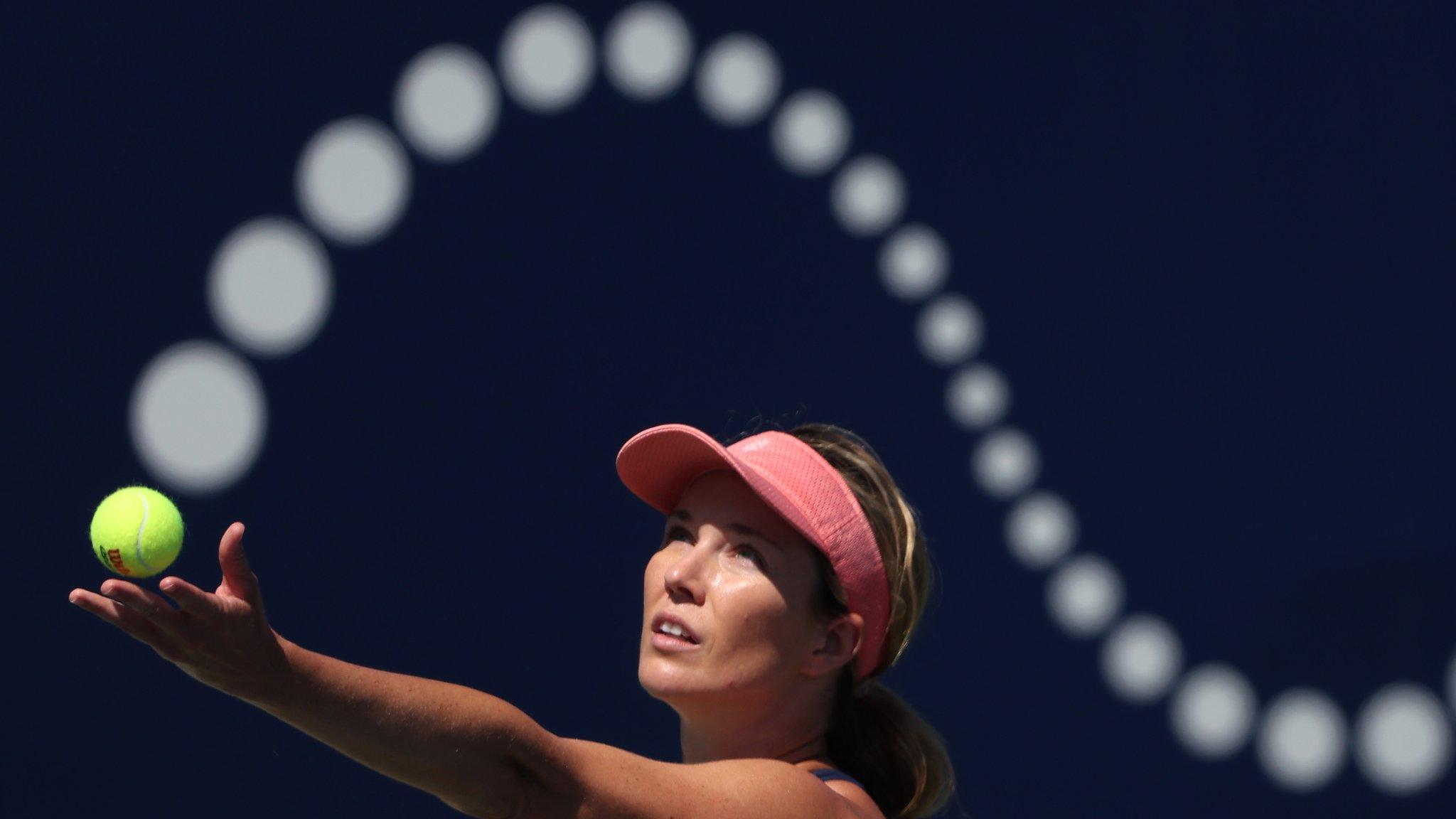 Danielle Collins serves against Caroline Garcia in the quarter-finals of the San Diego Open