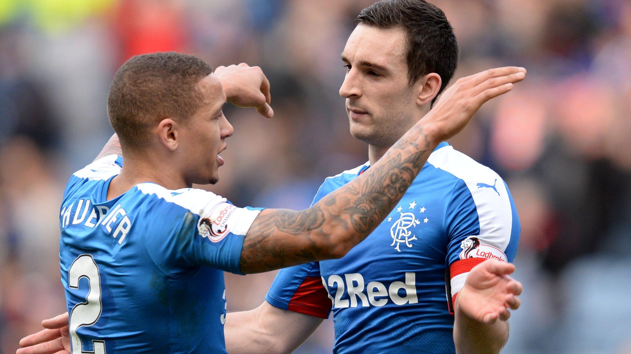 James Tavernier and Lee Wallace embrace