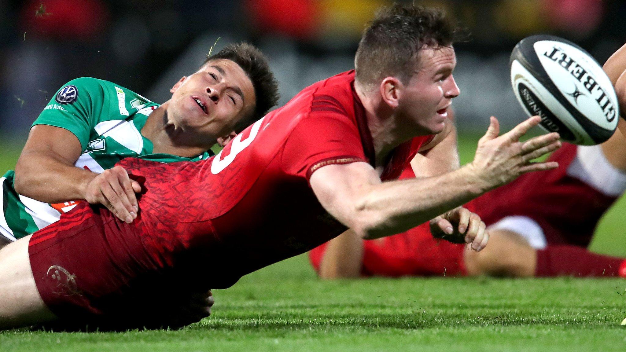 Treviso's Tommaso Allan tackles Munster's Chris Farrell